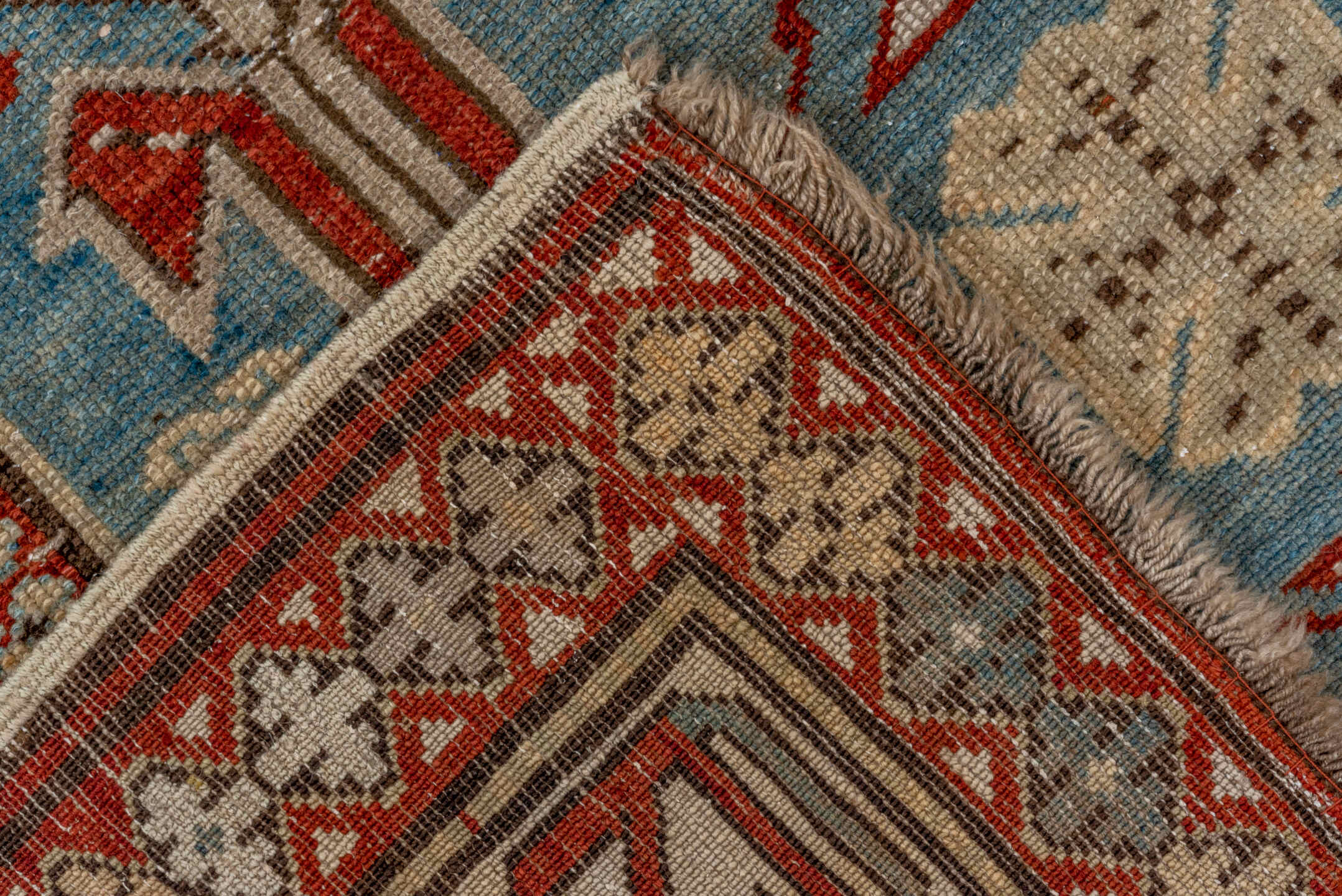 5' x 9' one-of-a-kind handmade antique Caucasian medium size rug. Color palette: light blue, ivory, rust, red, slate, camel
