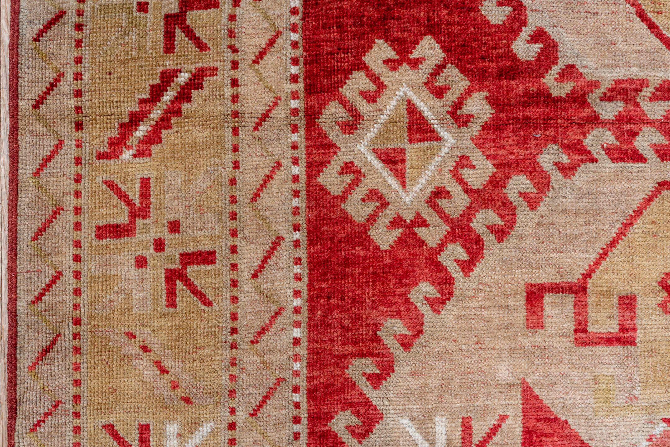 4' x 7' one-of-a-kind handmade vintage Caucasian rug. Color palette: brown, gray, light gray, off-white, pink, red