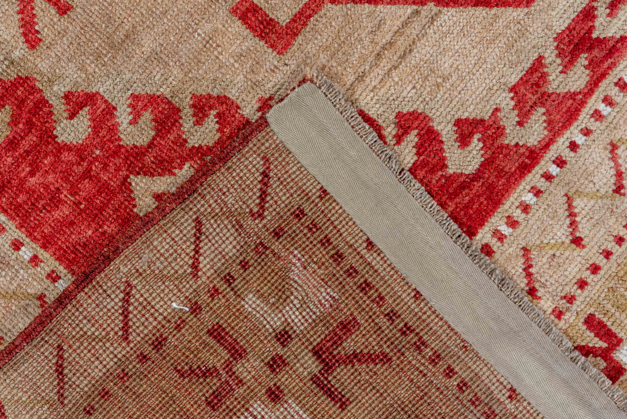 4' x 7' one-of-a-kind handmade vintage Caucasian rug. Color palette: brown, gray, light gray, off-white, pink, red