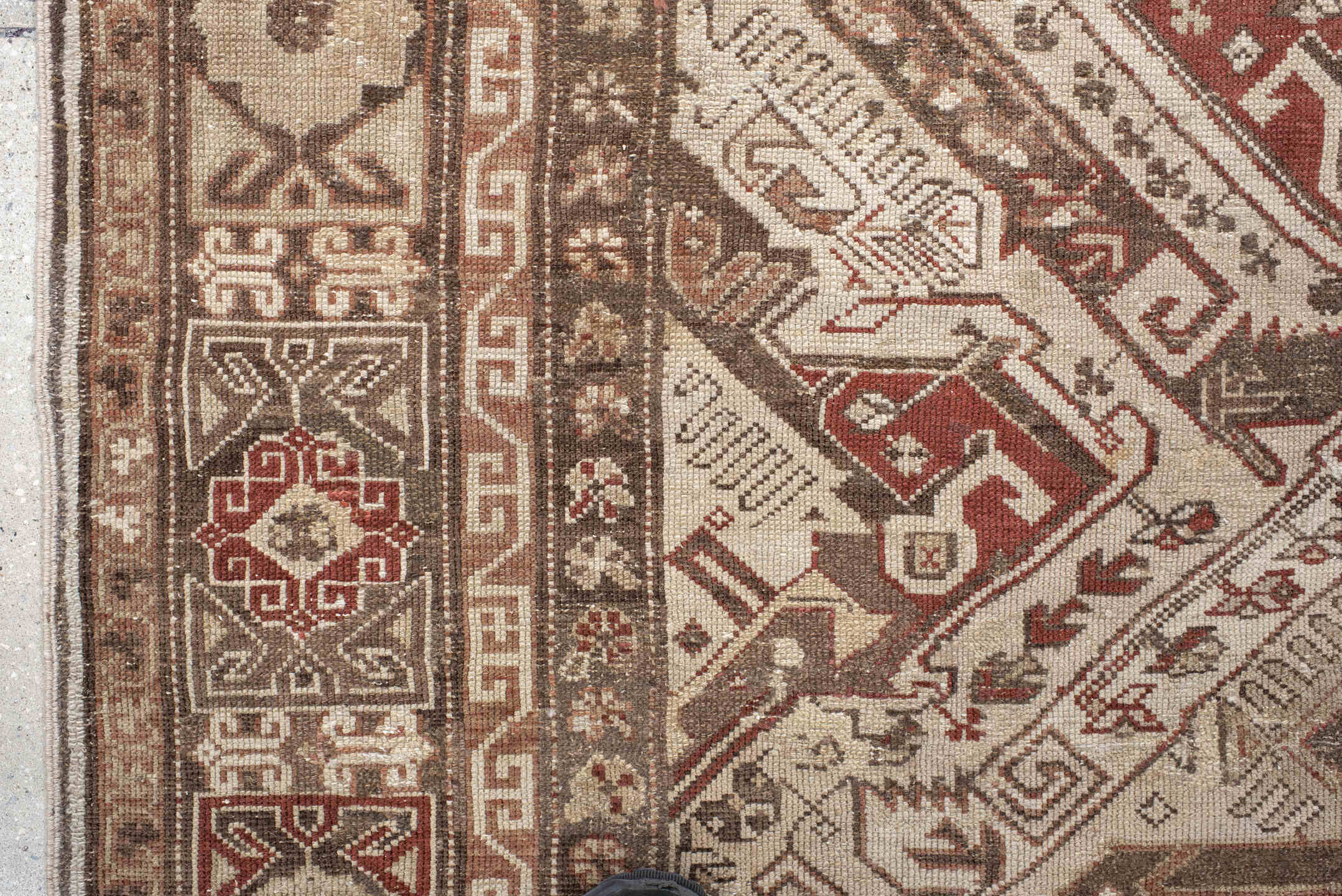 5' x 10' one-of-a-kind handmade vintage Caucasian medium size rug. Color palette: ivory, taupe, brown, rust, camel, rose