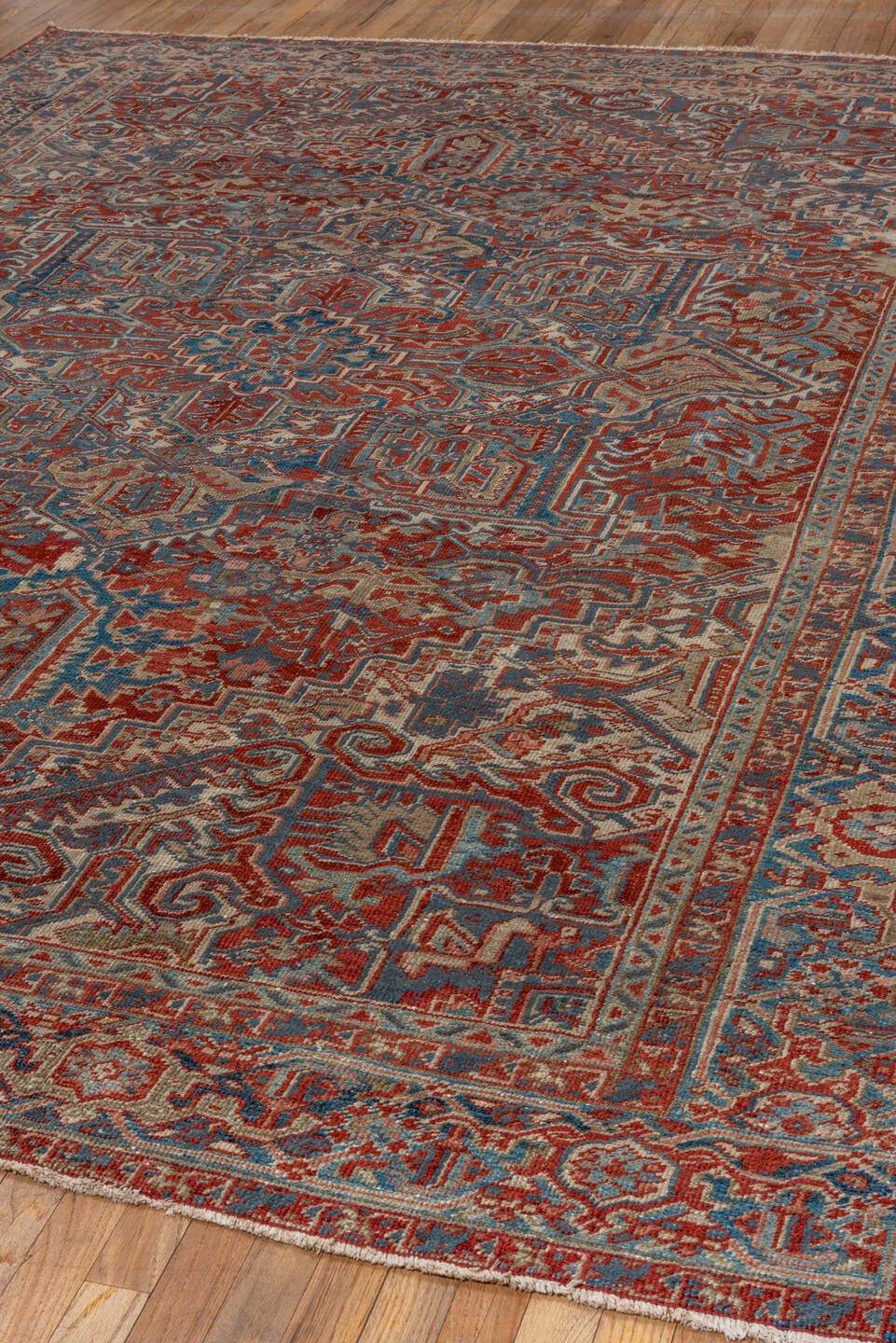 8' x 10' one-of-a-kind handmade antique Heriz large size rug. Color palette: rust, ivory, slate, navy, terra cotta, camel