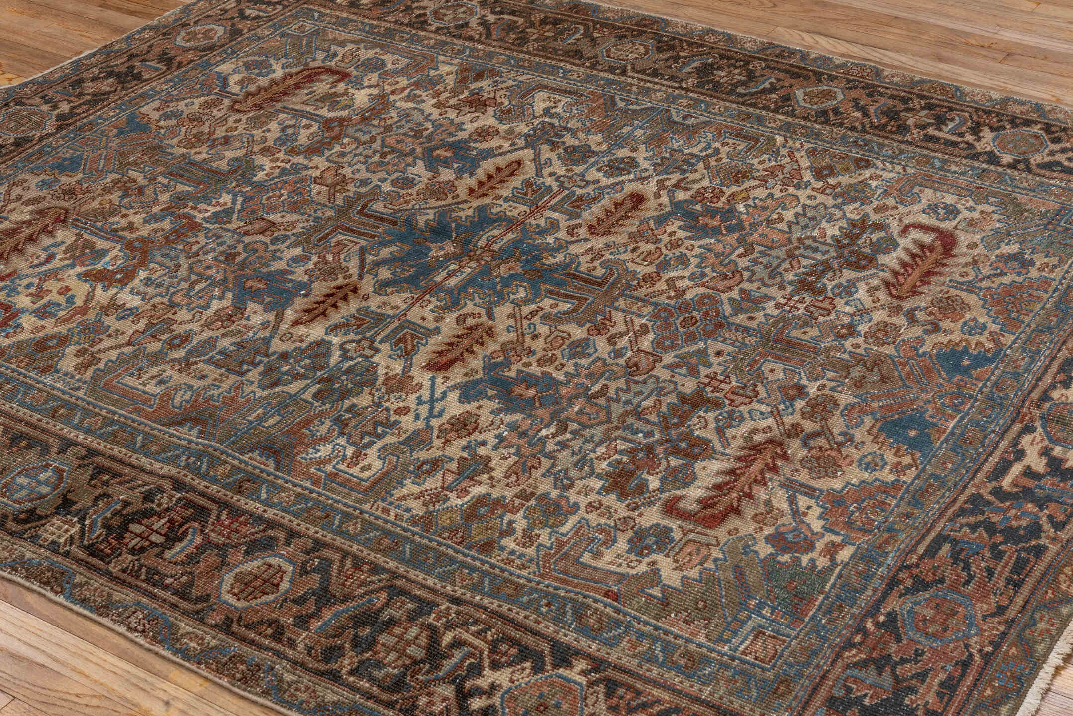 6' x 7' one-of-a-kind handmade vintage Heriz rug. Color palette: black, blue, brown, dark gray, dim gray, gainsboro, gray