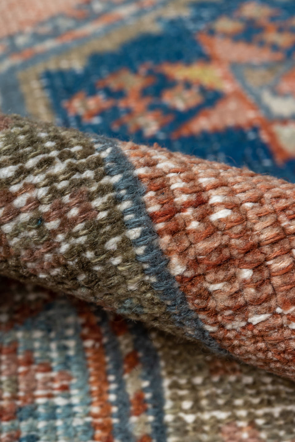 2' x 4' one-of-a-kind handmade antique Heriz small size rug. Color palette: ivory, faded coral, slate blue, indigo, taupe