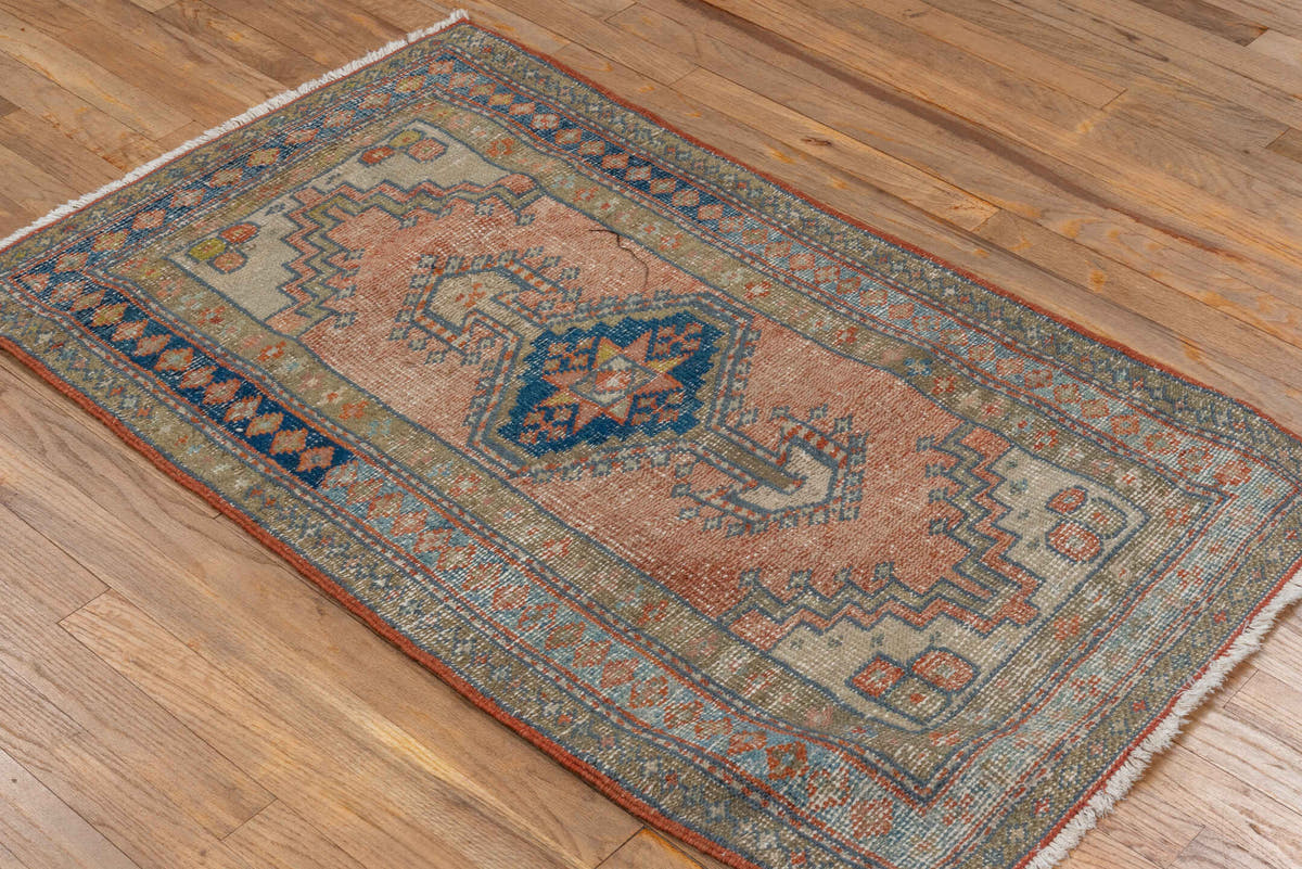 2' x 4' one-of-a-kind handmade antique Heriz small size rug. Color palette: ivory, faded coral, slate blue, indigo, taupe