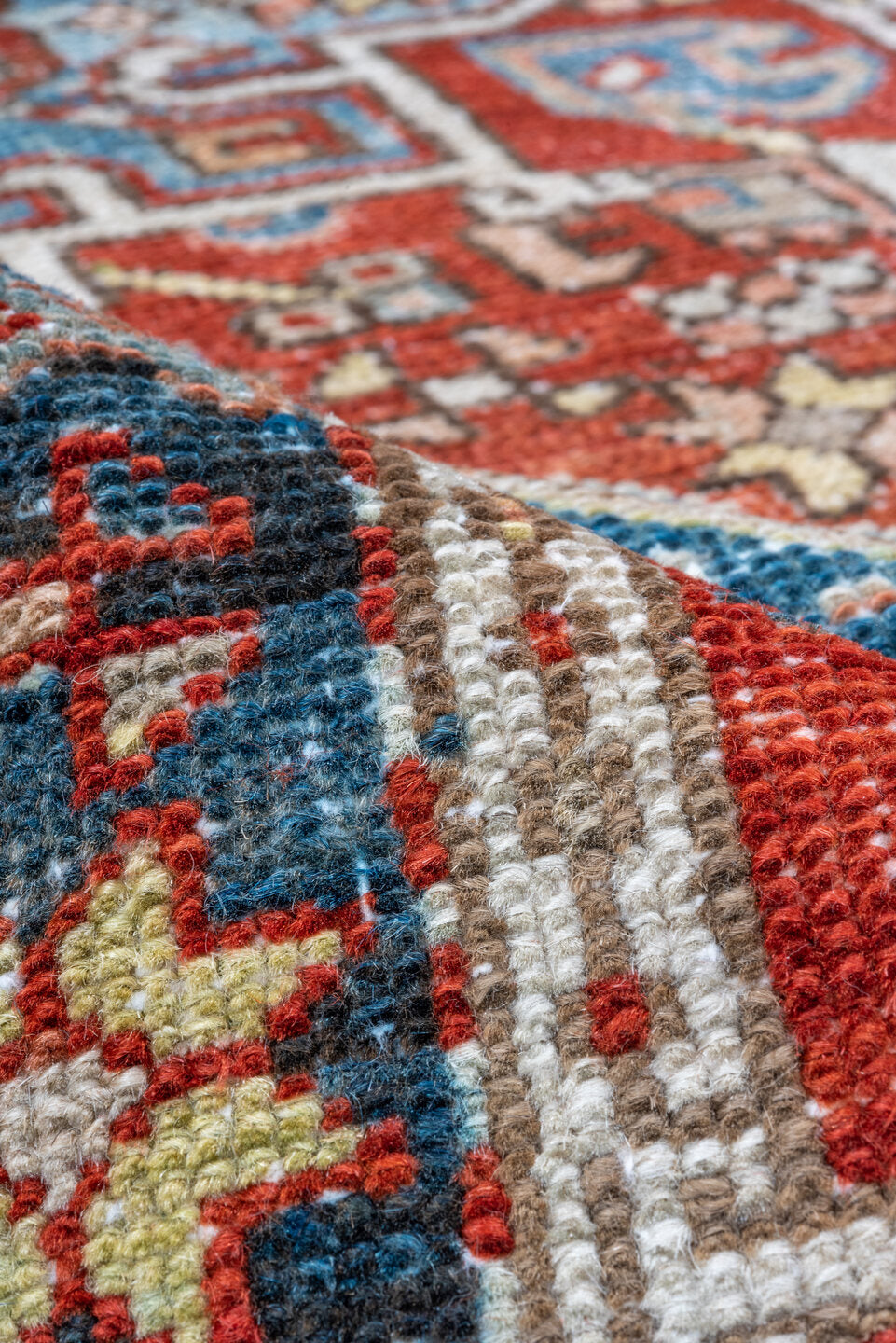 3' x 4' one-of-a-kind handmade vintage Karaje small size rug. Color palette: black, blue, brown, charcoal, gray, light gray