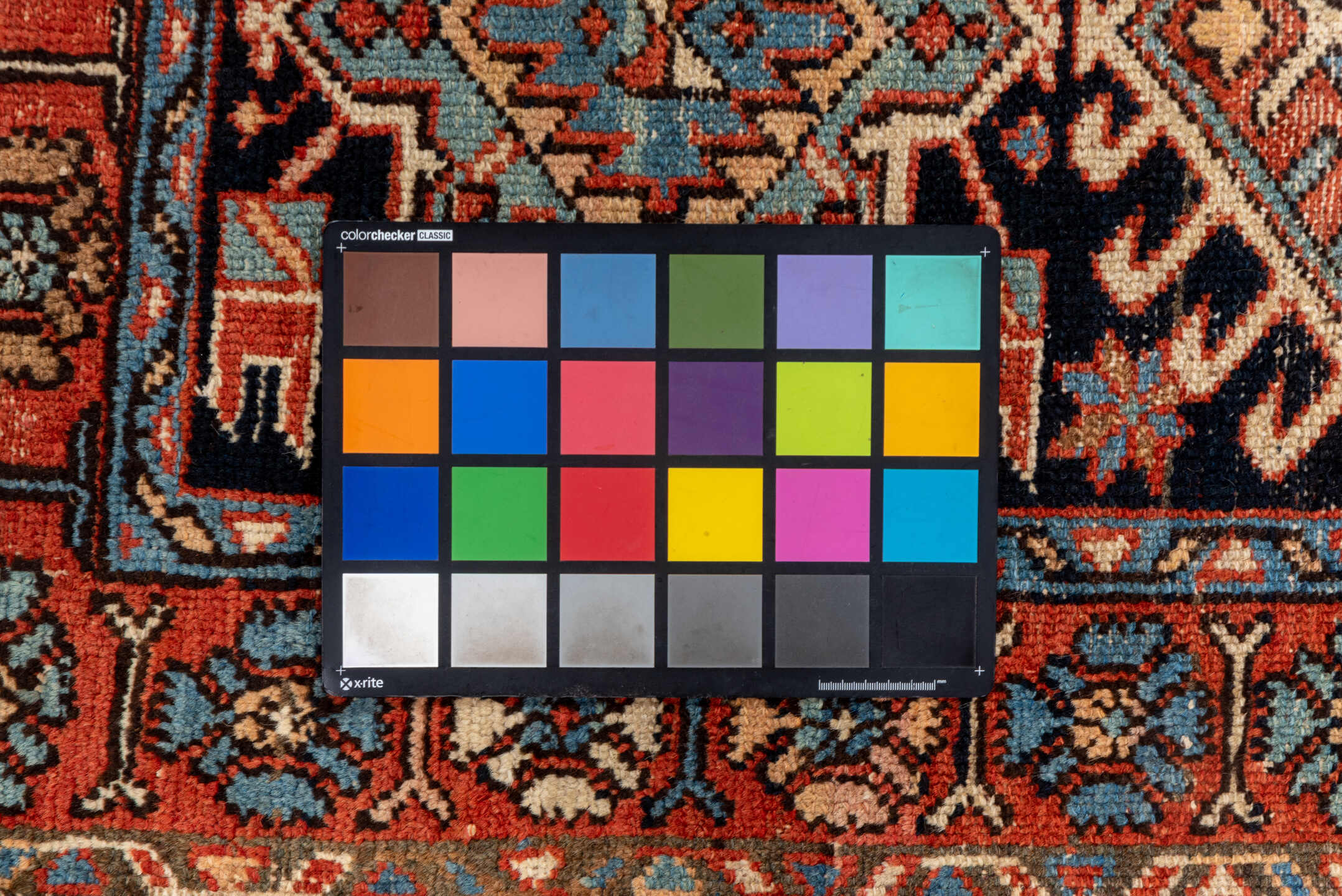 2' x 4' one-of-a-kind handmade vintage Karaje small size rug. Color palette: blue, brown, gray, pink, red