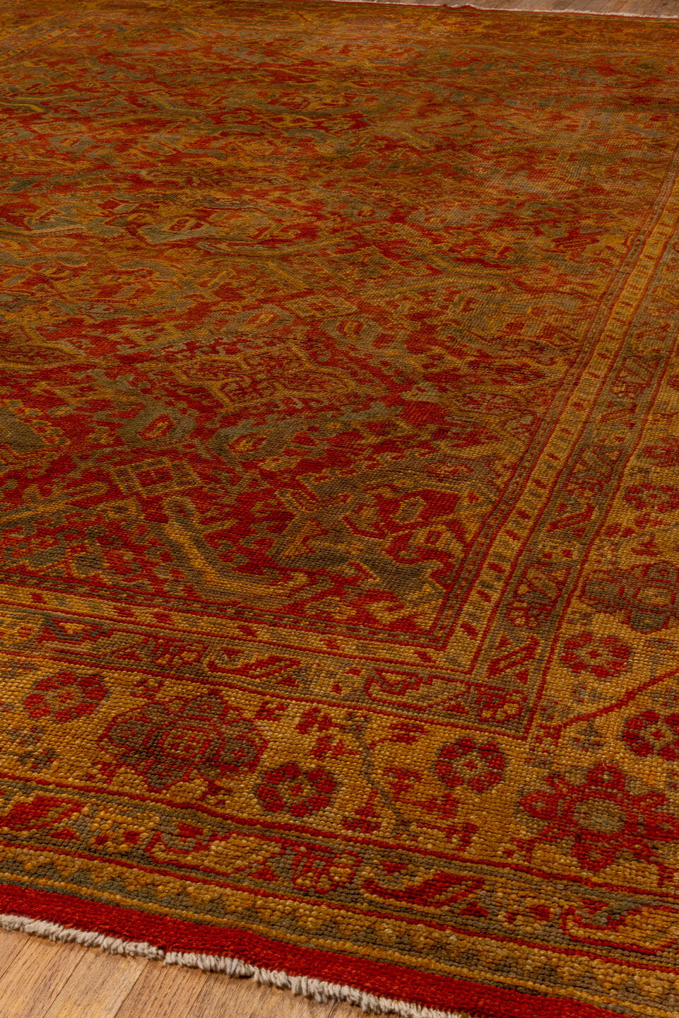 10' x 15' one-of-a-kind handmade antique Oushak rug. Color palette: rust, gold, terra cotta, slate, camel, sienna