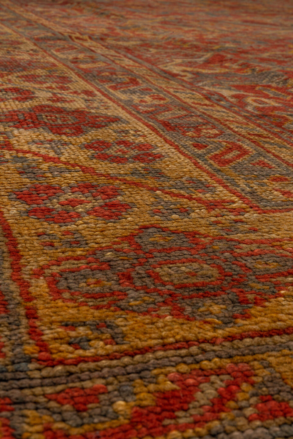10' x 15' one-of-a-kind handmade antique Oushak rug. Color palette: rust, gold, terra cotta, slate, camel, sienna