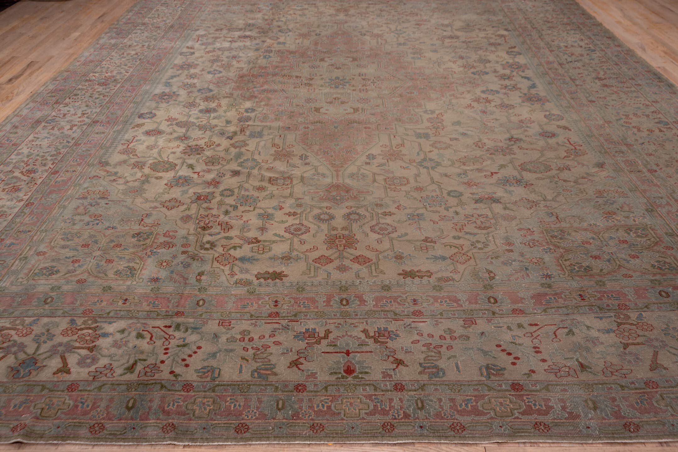 13' x 16' one-of-a-kind handmade antique Sivas oversize rug. Color palette: ivory, rose, taupe, muted blue, dusty pink