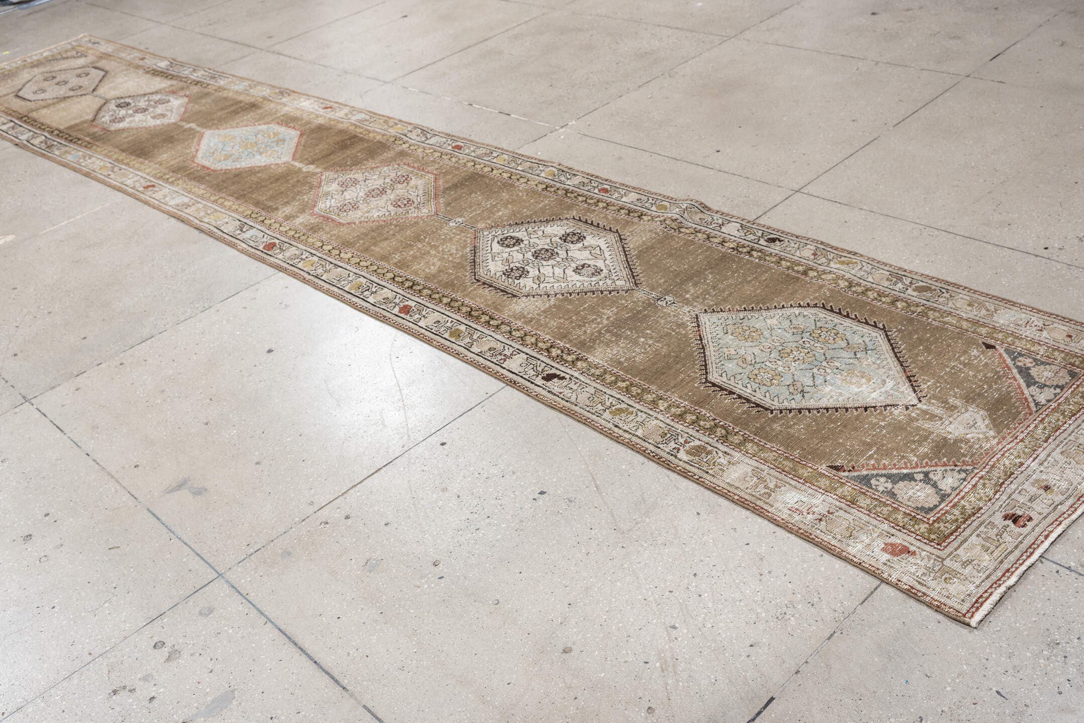 3' x 17' one-of-a-kind handmade antique NW Persian runner rug. Color palette: taupe, ivory, camel, pale blue, terracotta