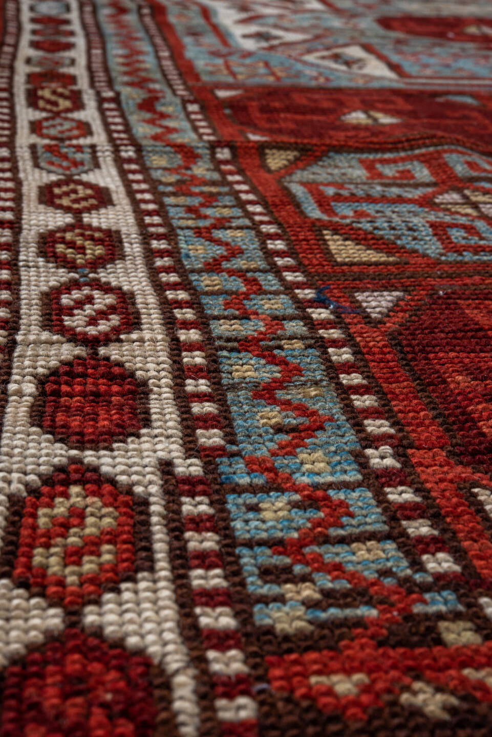 3' x 13' one-of-a-kind handmade antique Anatolian runner rug. Color palette: rust, pale blue, ivory, brick, brown, charcoal