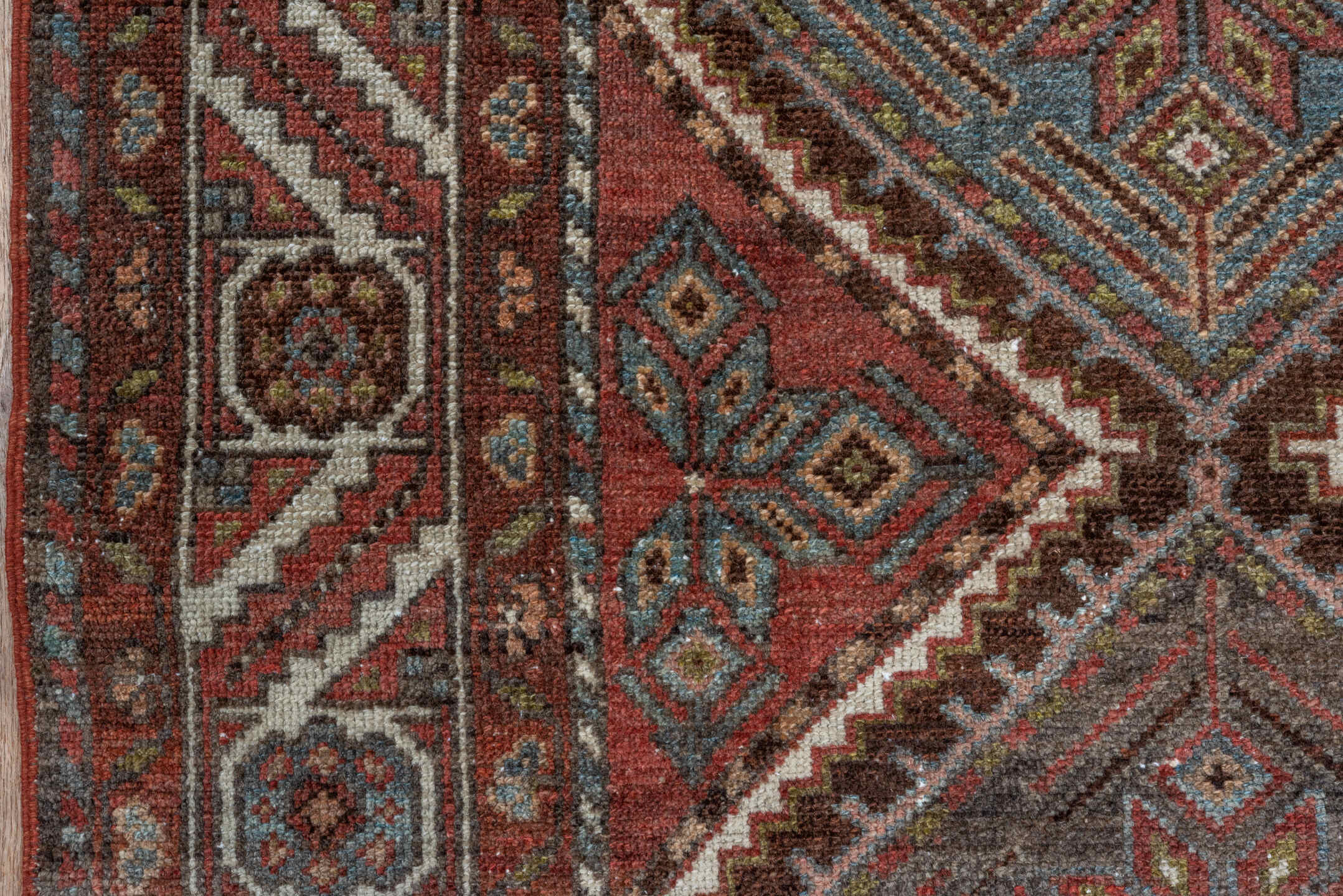 5' x 10' one-of-a-kind handmade antique Baktiary medium size rug. Color palette: rust, ivory, sky blue, brown, burgundy
