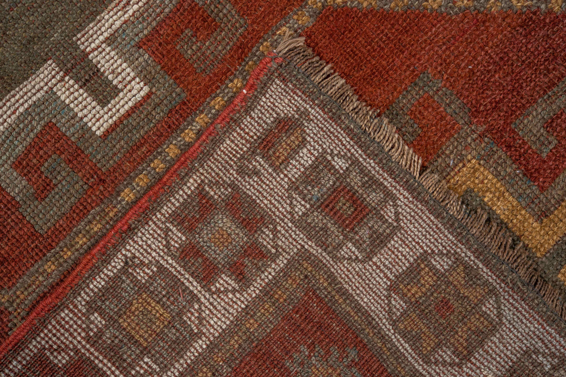 3' x 9' one-of-a-kind handmade antique Caucasian runner rug. Color palette: rust, ivory, brown, taupe, camel, gold, slate