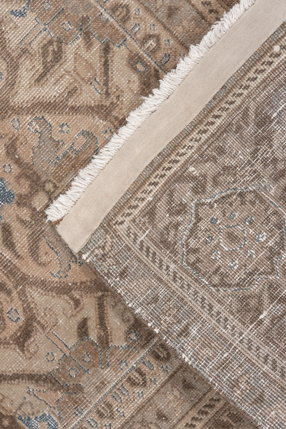7' x 10' one-of-a-kind handmade vintage Heriz large size rug. Color palette: taupe, ivory, brown, beige, camel, pale blue