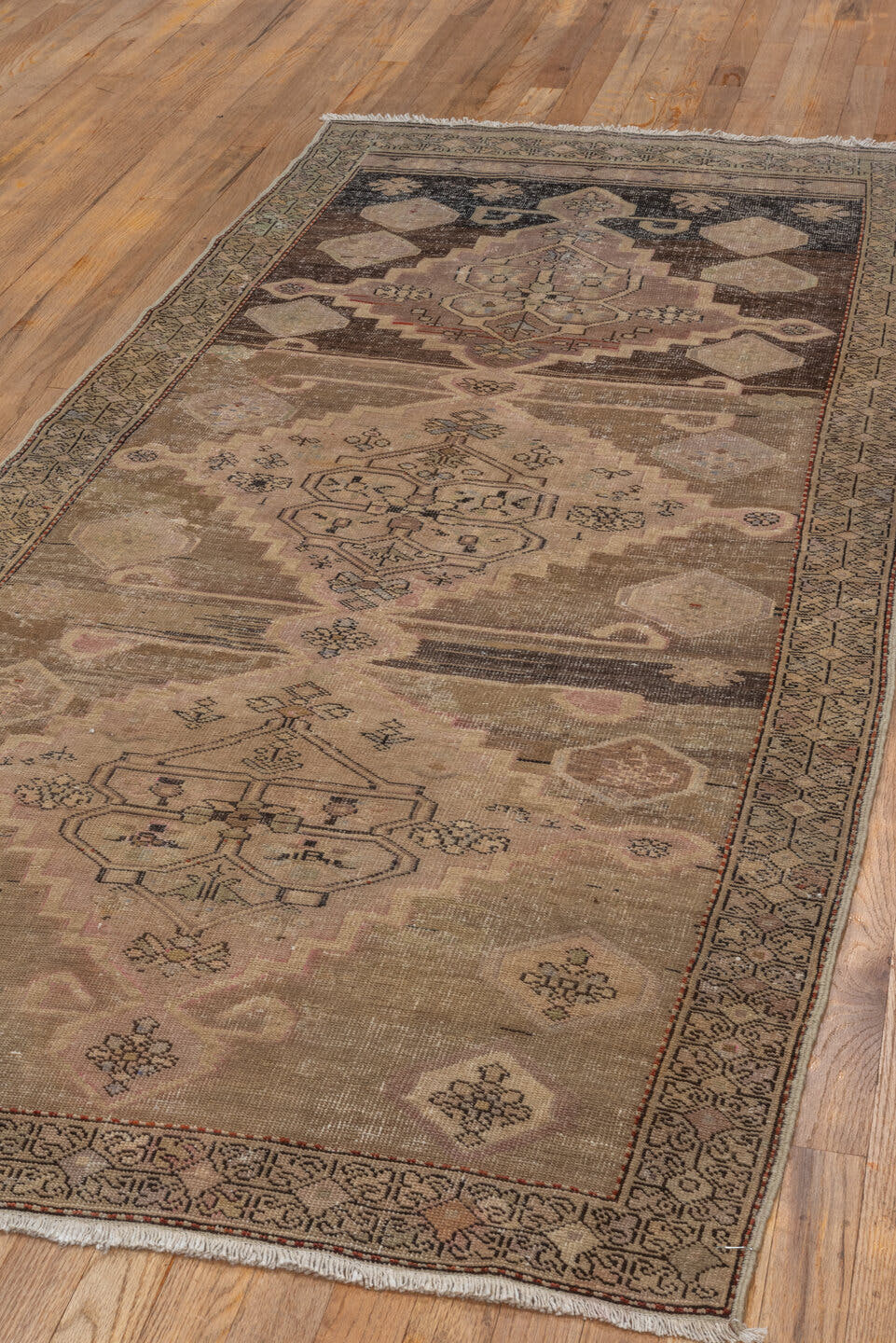 3' x 7' one-of-a-kind handmade antique Caucasian runner rug. Color palette: taupe, ivory, charcoal, blush, brown, camel