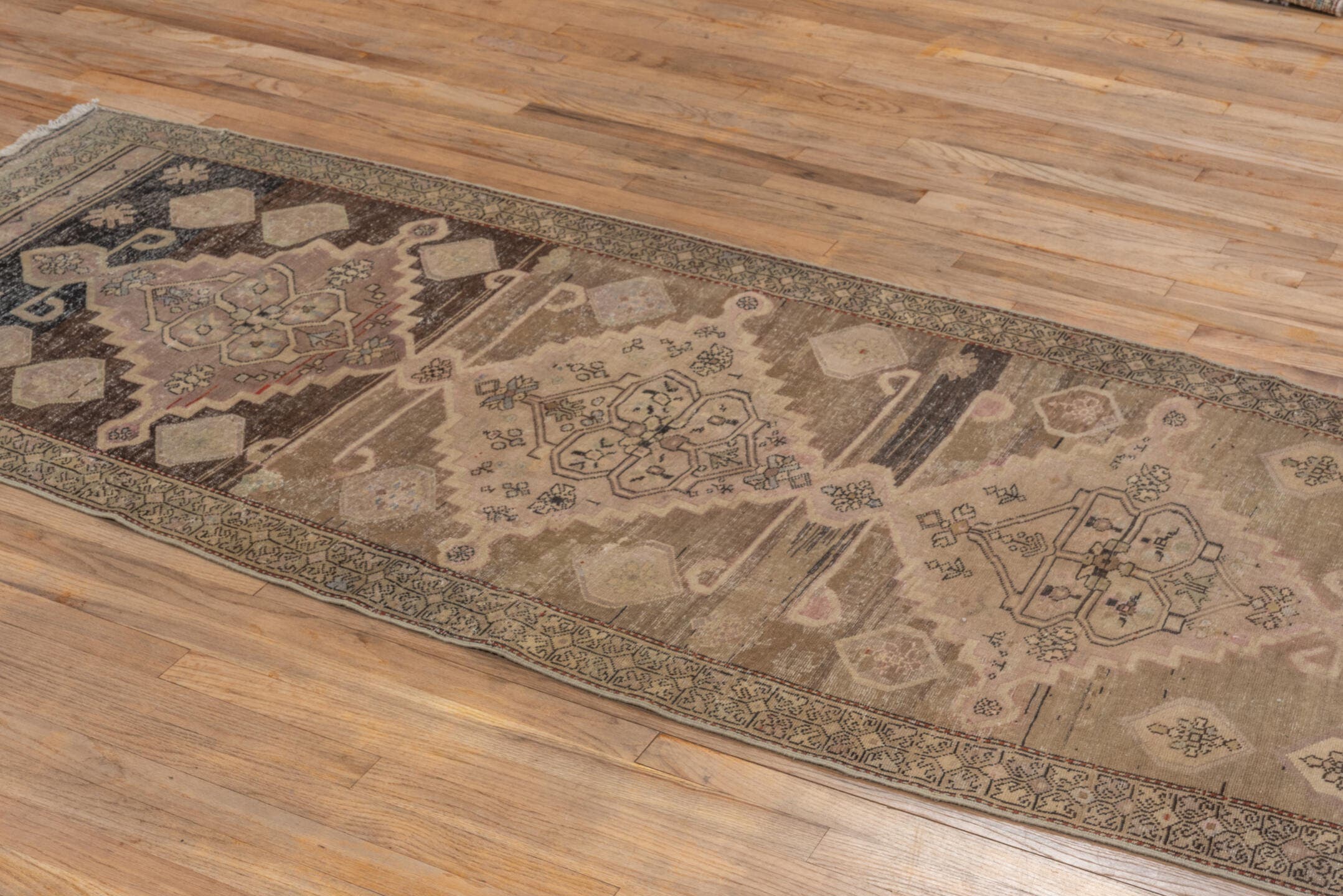 3' x 7' one-of-a-kind handmade antique Caucasian runner rug. Color palette: taupe, ivory, charcoal, blush, brown, camel