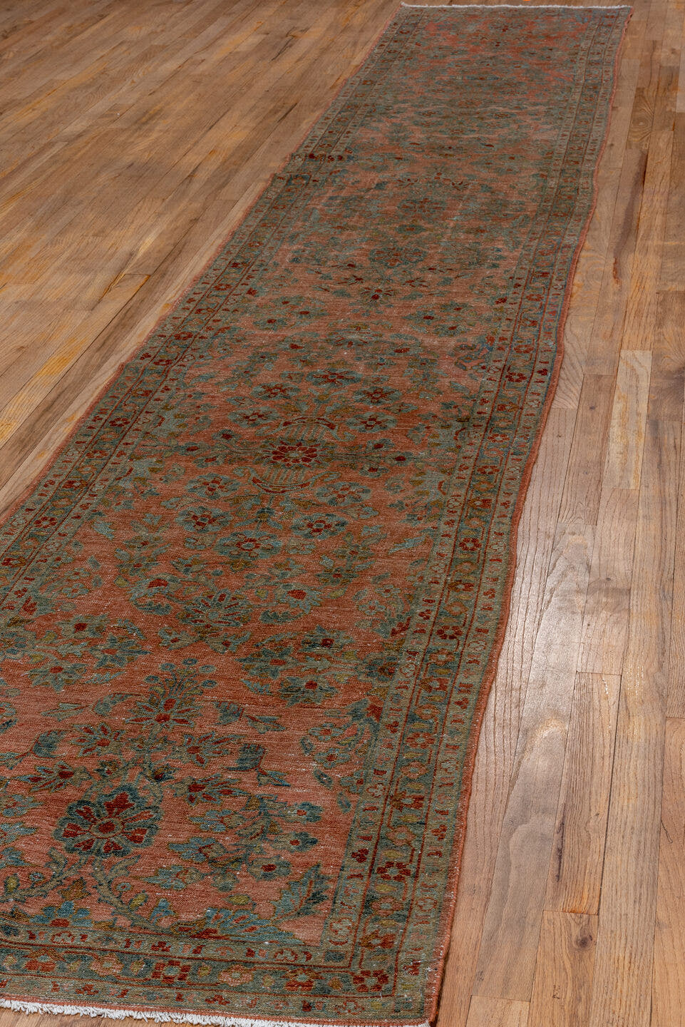 2' x 15' one-of-a-kind handmade antique Lilian runner rug. Color palette: rose, terra cotta, slate, sage, rust, ivory, pink