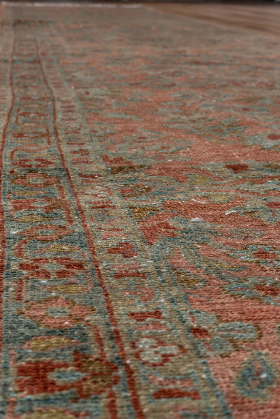 2' x 15' one-of-a-kind handmade antique Lilian runner rug. Color palette: rose, terra cotta, slate, sage, rust, ivory, pink