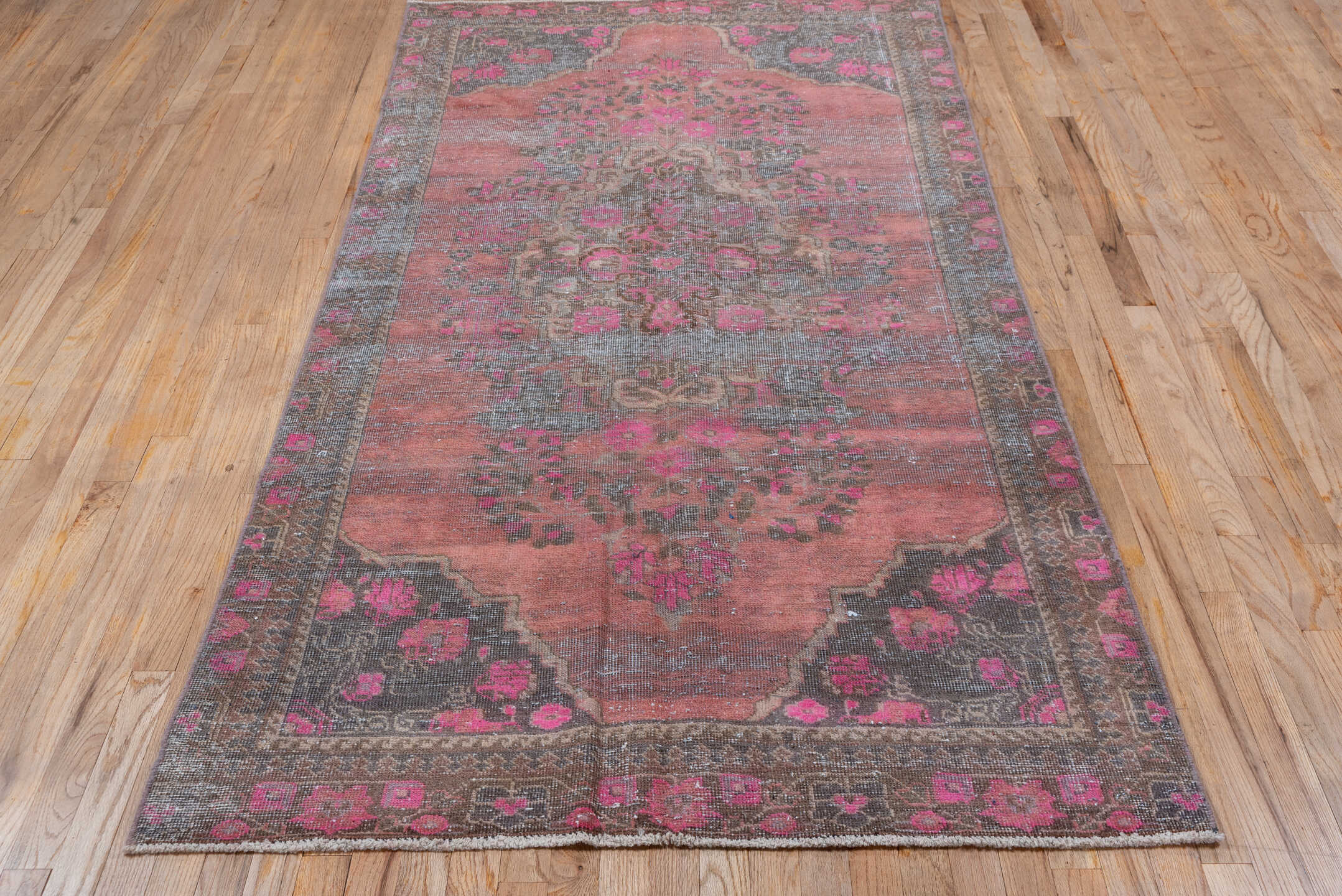 4' x 8' one-of-a-kind handmade vintage Distressed rug. Color palette: rose, charcoal, taupe, crimson, brown, pink, red, gray