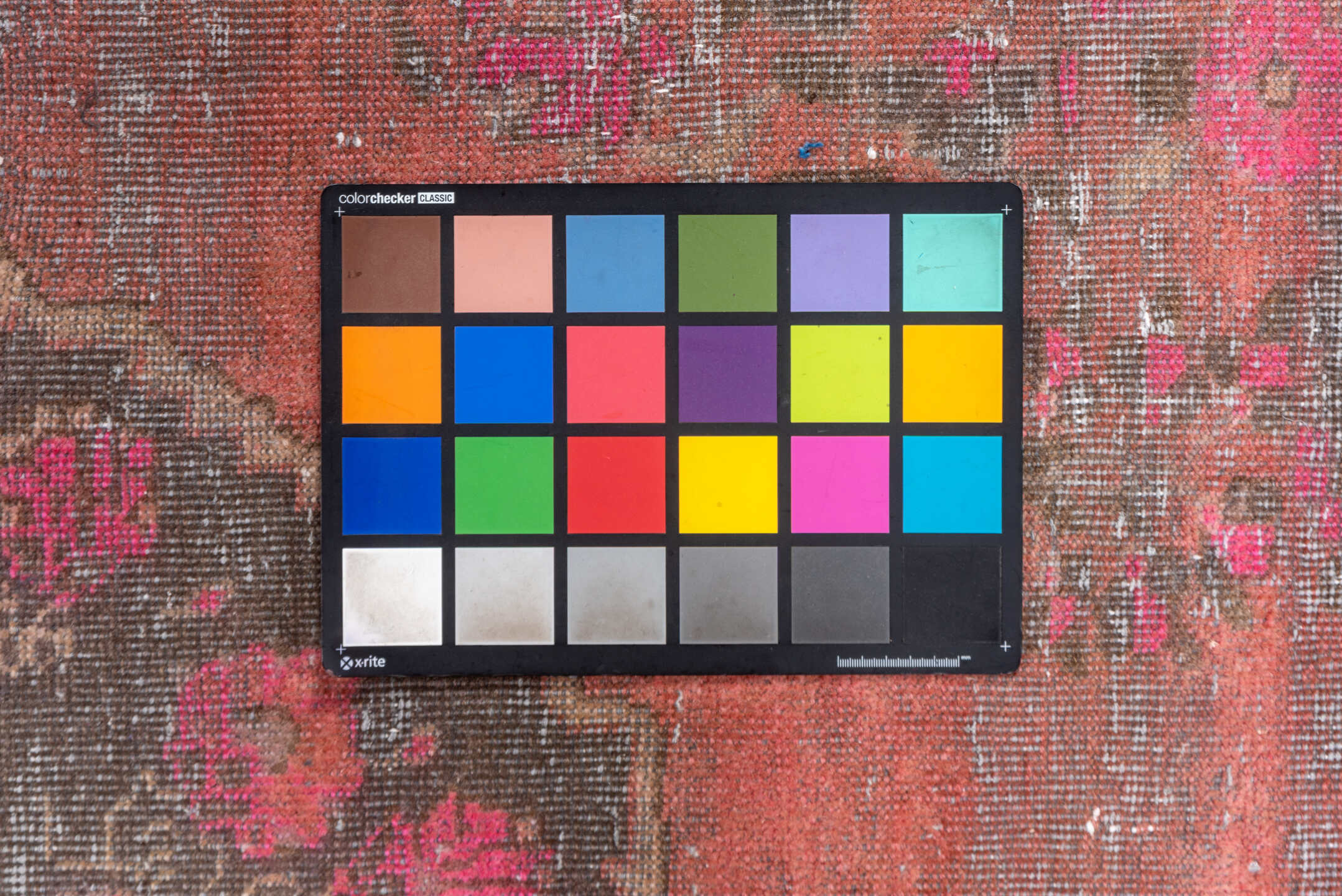 4' x 8' one-of-a-kind handmade vintage Distressed rug. Color palette: brown, gray, light gray, pink, red, rosy brown