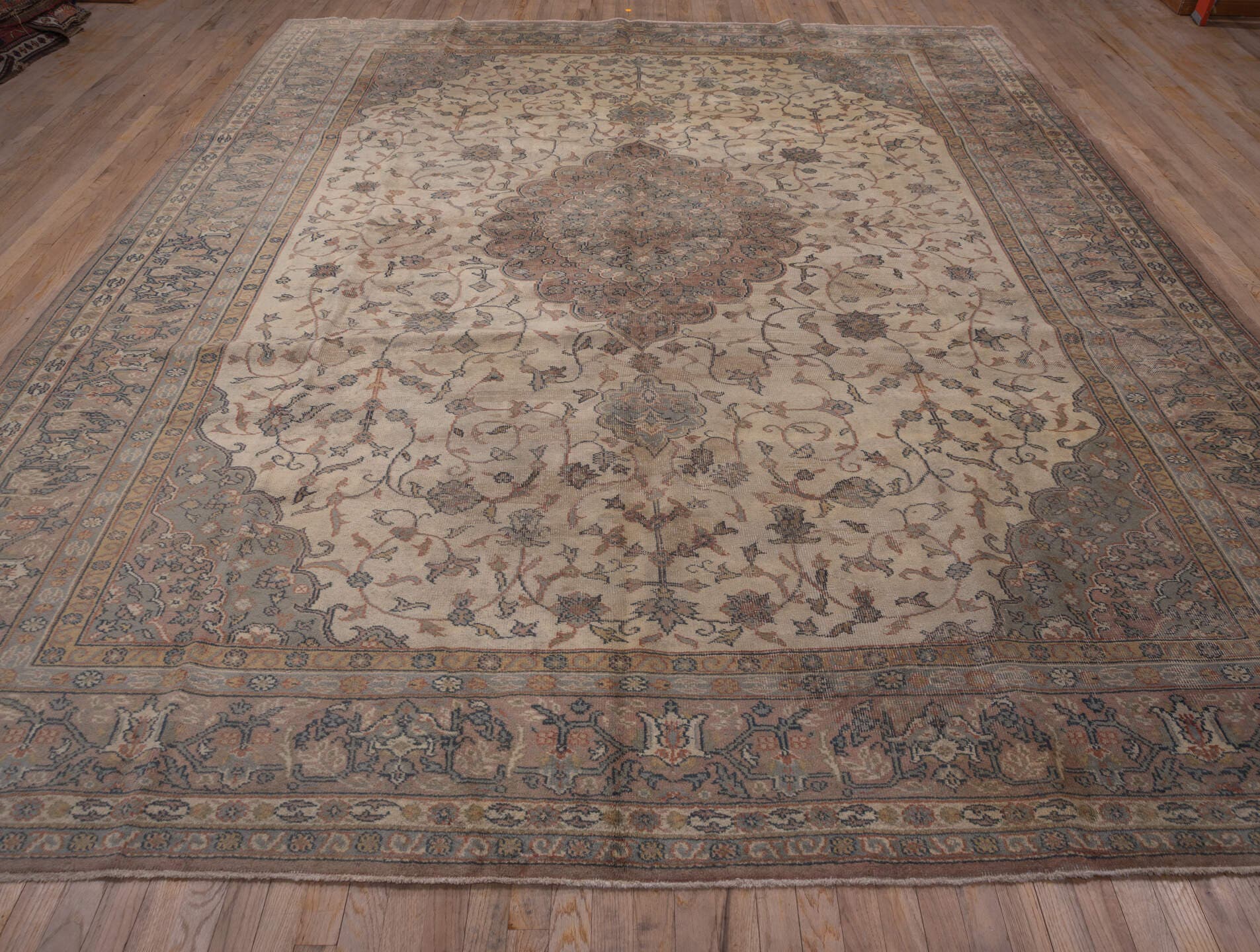 10' x 13' one-of-a-kind handmade vintage Sivas large size rug. Color palette: ivory, taupe, rose, blue-gray, camel, slate