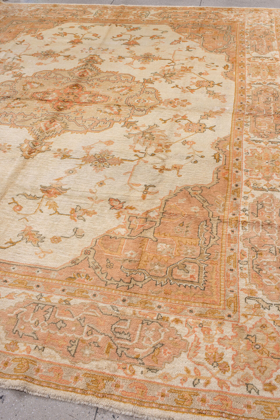 10' x 12' one-of-a-kind handmade antique Oushak large size rug. Color palette: ivory, peach, apricot, muted gold, taupe