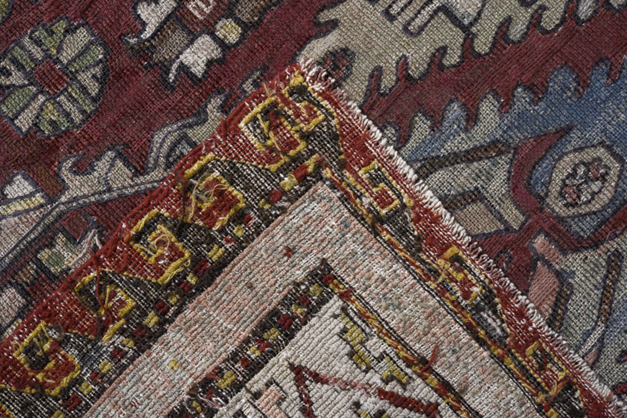 7' x 9' one-of-a-kind handmade vintage Sumak rug. Color palette: black, blue, brown, dark gray, dim gray, gray, light gray