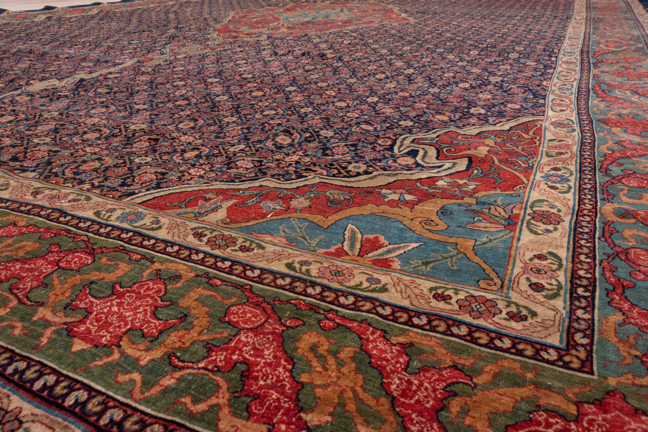 11' x 18' one-of-a-kind handmade antique Bidjar oversize rug. Color palette: navy, rust, ivory, soft blue, red, sage, camel