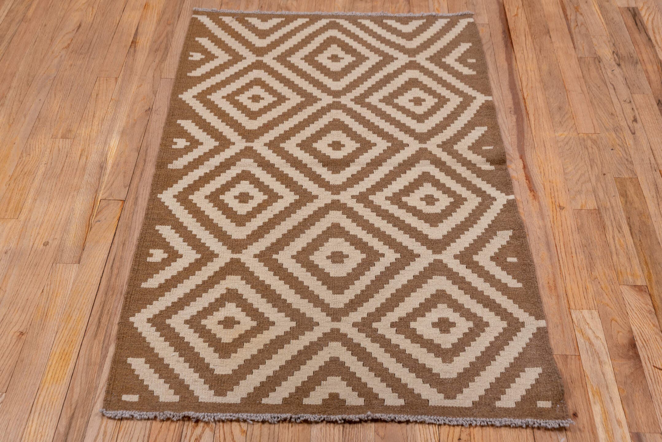 3' x 5' one-of-a-kind handmade vintage Kilim small size rug. Color palette: brown, ivory
