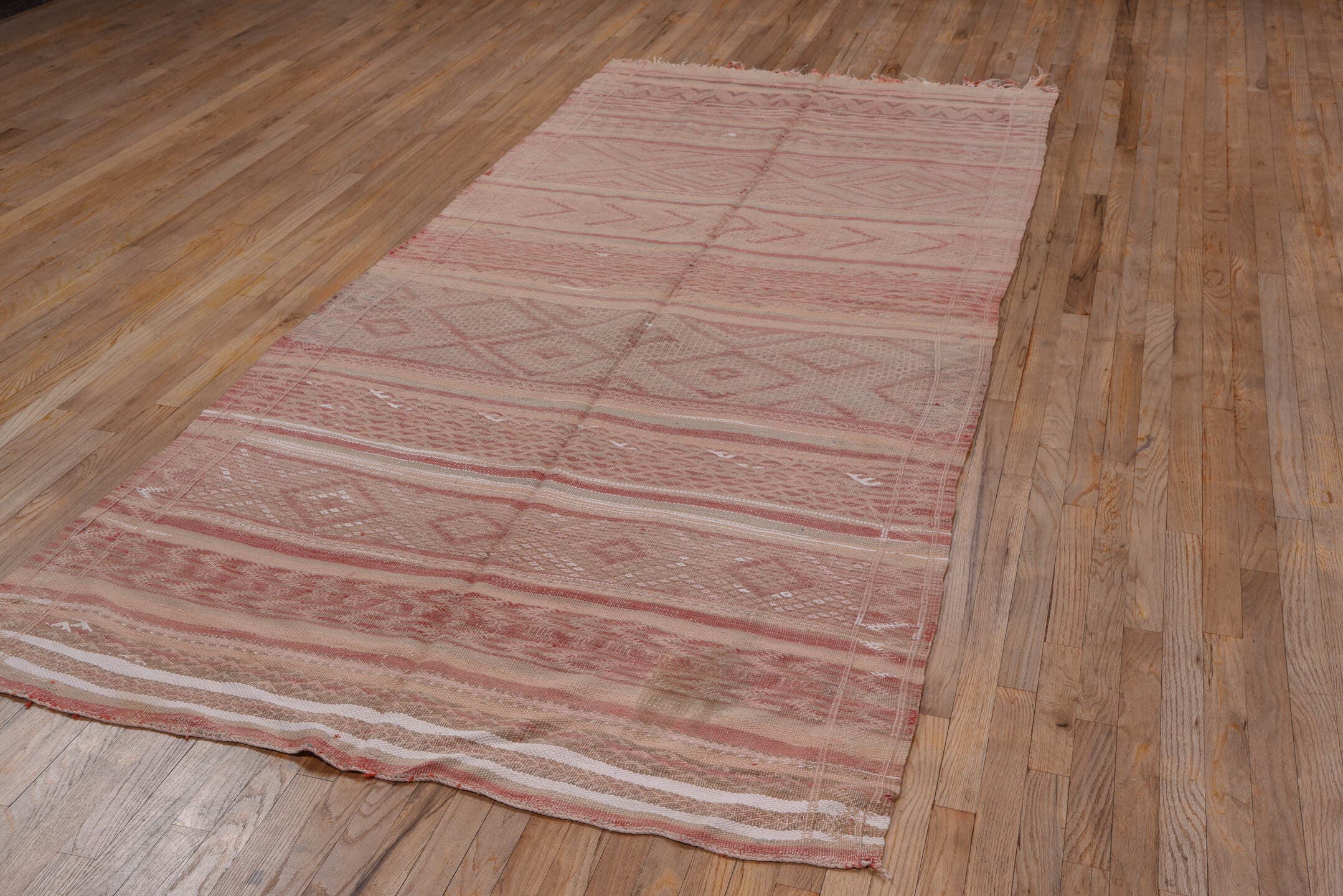 4' x 10' one-of-a-kind handmade vintage Moroccan runner rug. Color palette: blush, rose, dusty pink, taupe, ivory, sand