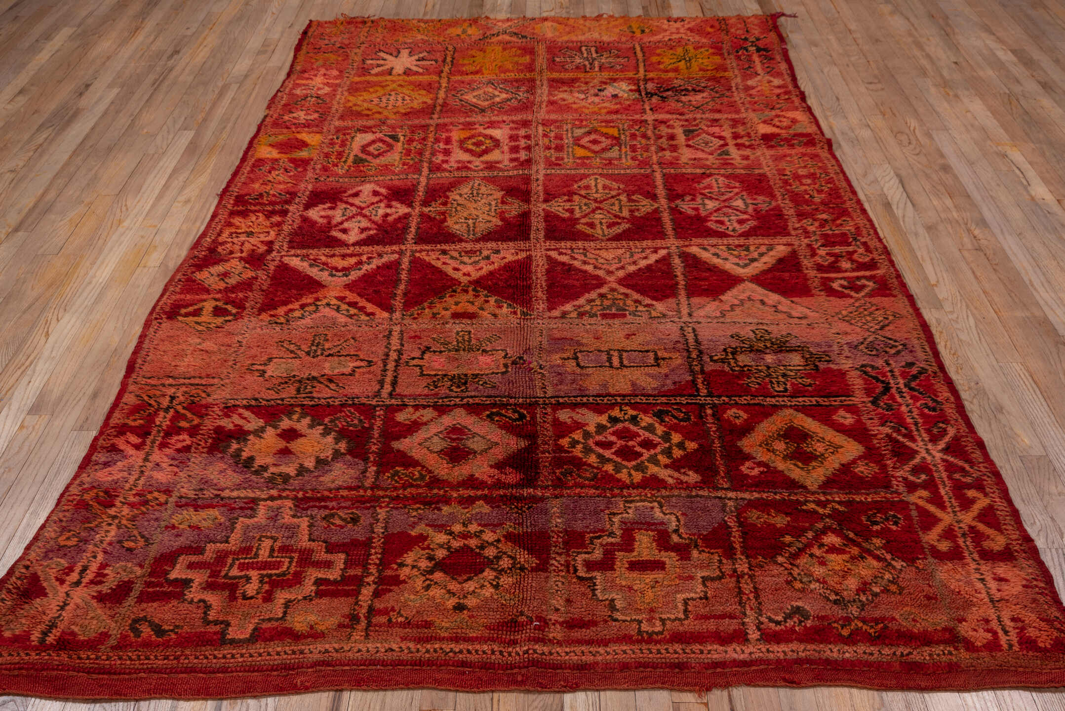 5' x 9' one-of-a-kind handmade vintage Moroccan medium size rug. Color palette: rust, rose, blush, burgundy, muted gold