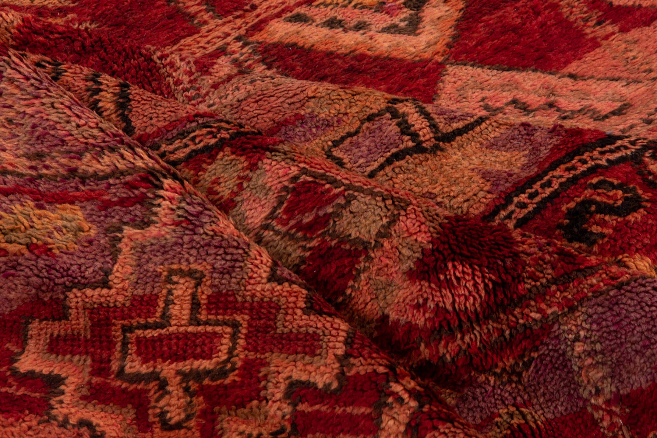 5' x 9' one-of-a-kind handmade vintage Moroccan medium size rug. Color palette: rust, rose, blush, burgundy, muted gold