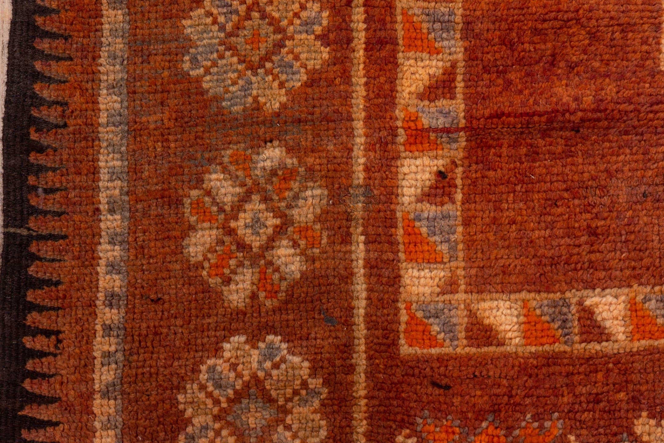 5' x 12' one-of-a-kind handmade vintage Moroccan rug. Color palette: rust, terra cotta, ivory, brown, camel, slate