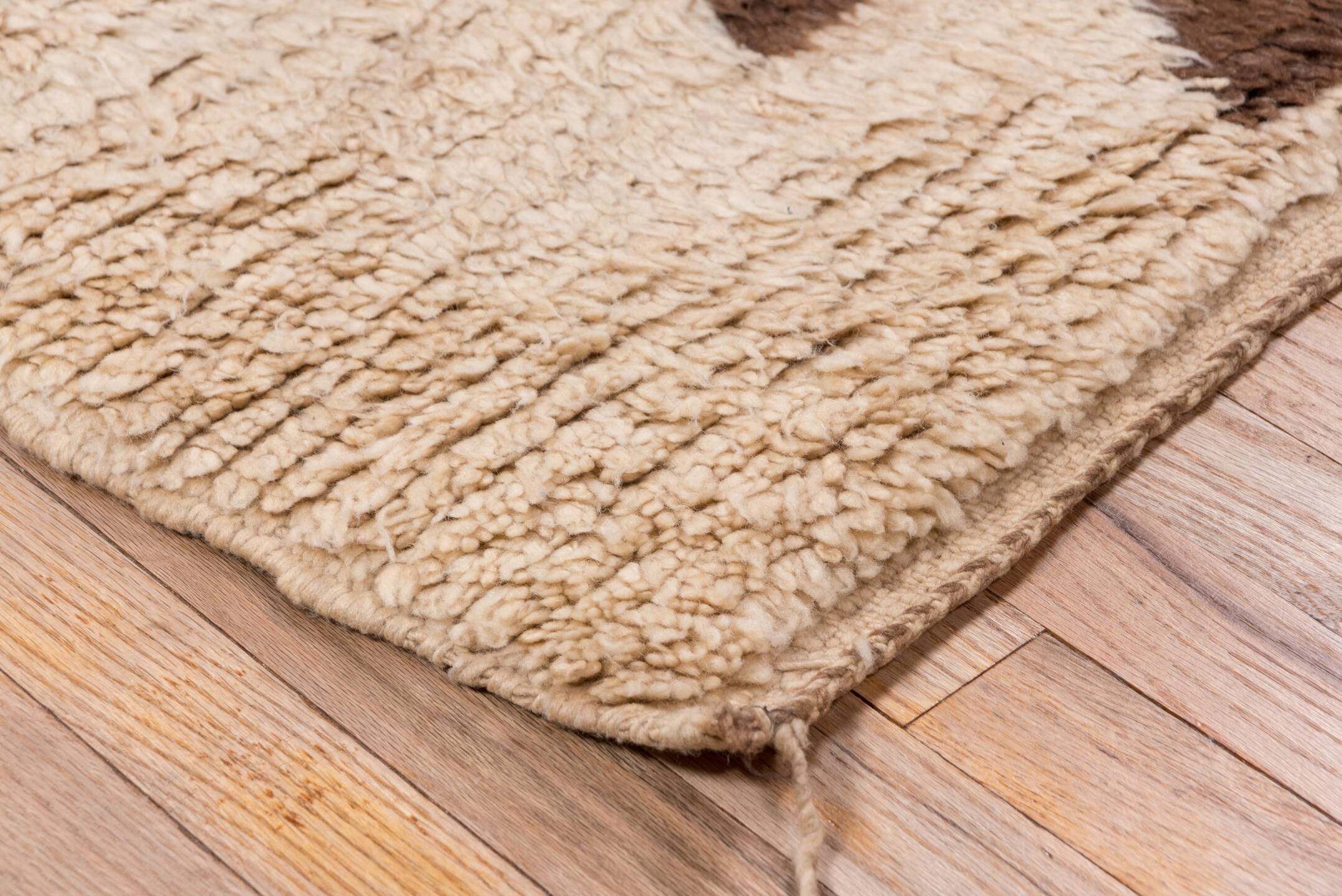 2' x 5' one-of-a-kind handmade vintage Moroccan small size rug. Color palette: brown, gray, off-white, orange, pink