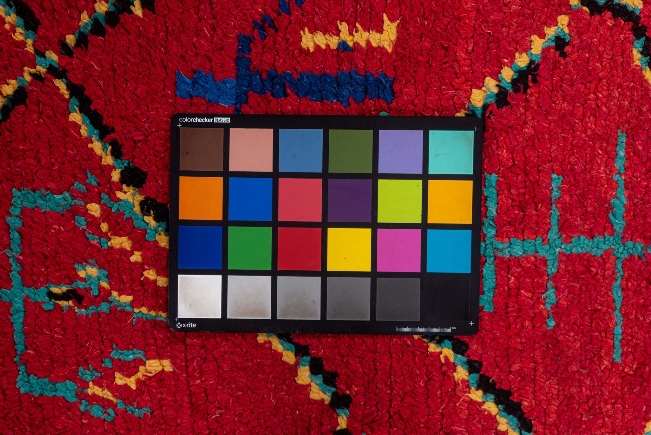 3' x 6' one-of-a-kind handmade vintage Moroccan small size rug. Color palette: coral, turquoise, cobalt, black, ivory, rose