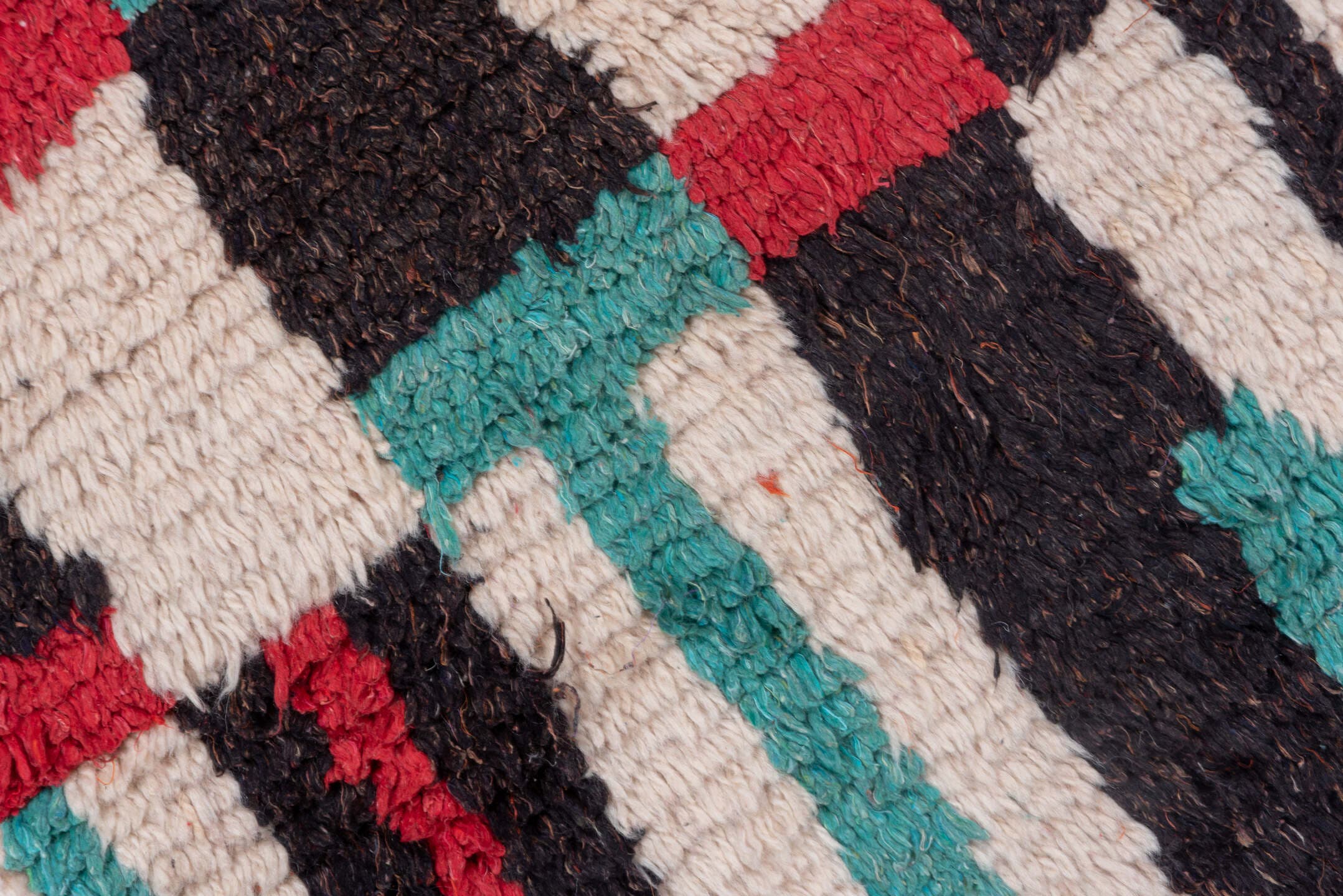 4' x 6' one-of-a-kind handmade vintage Moroccan small size rug. Color palette: ivory, turquoise, crimson, charcoal, rose