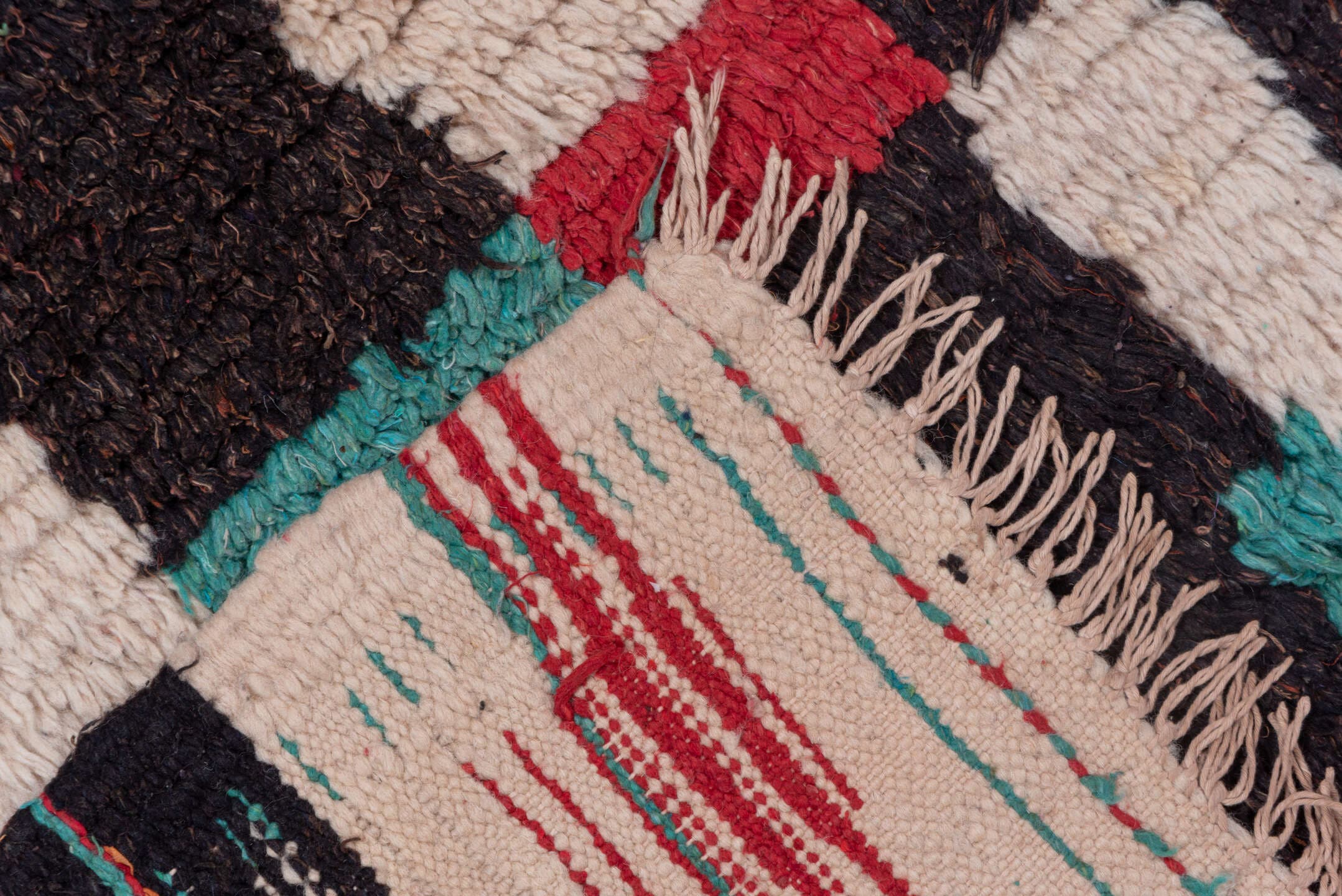 4' x 6' one-of-a-kind handmade vintage Moroccan small size rug. Color palette: ivory, turquoise, crimson, charcoal, rose