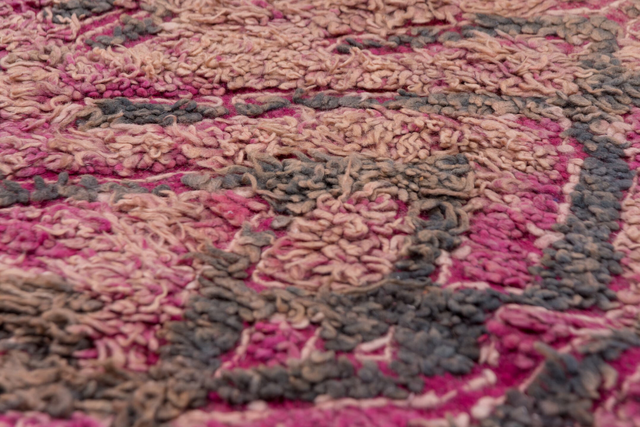 5' x 10' one-of-a-kind handmade vintage Moroccan medium size rug. Color palette: brown, gray, light gray, off-white, pink