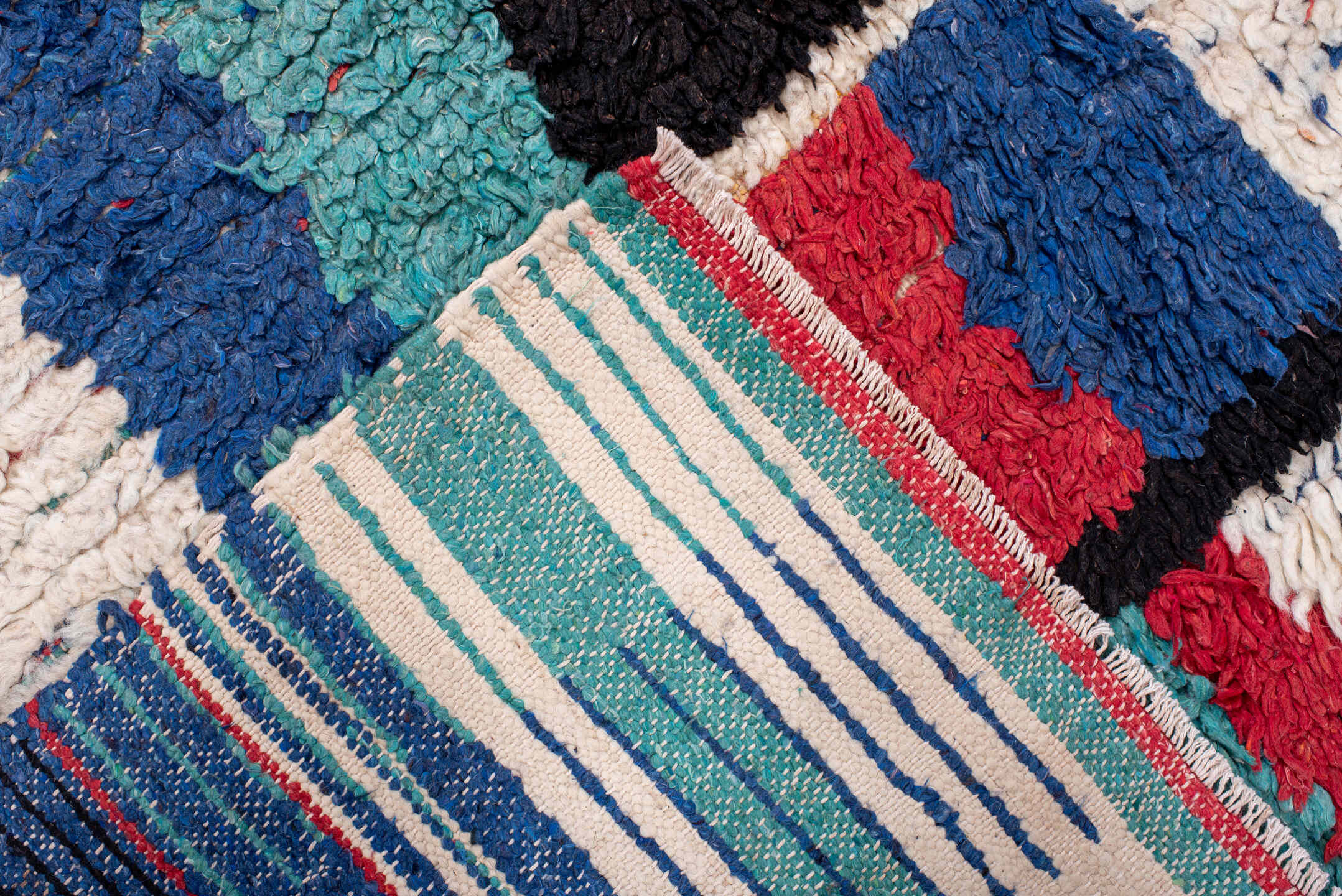4' x 6' one-of-a-kind handmade vintage Moroccan small size rug. Color palette: ivory, cobalt, red, turquoise, black, blue