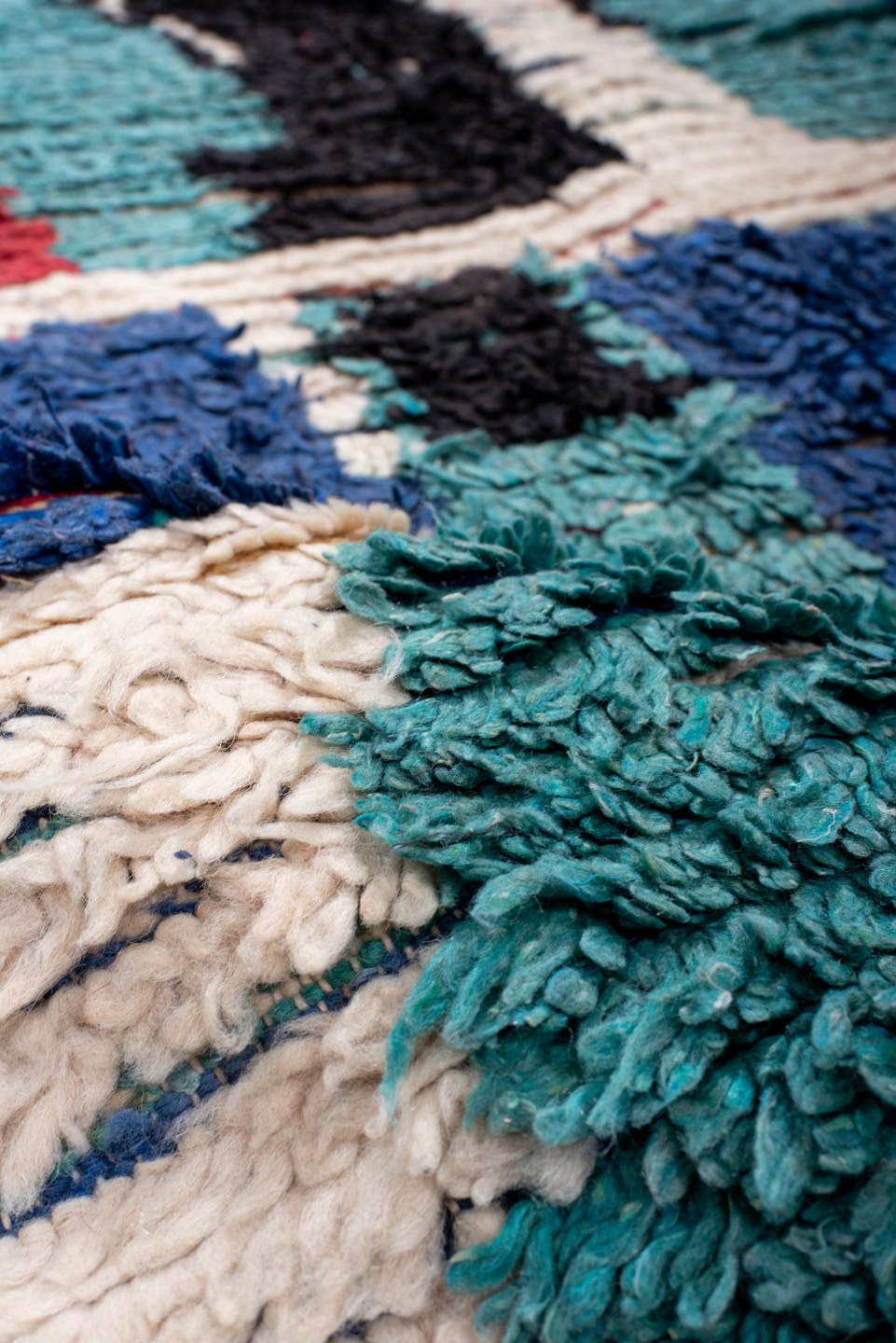 4' x 6' one-of-a-kind handmade vintage Moroccan small size rug. Color palette: ivory, cobalt, red, turquoise, black, blue