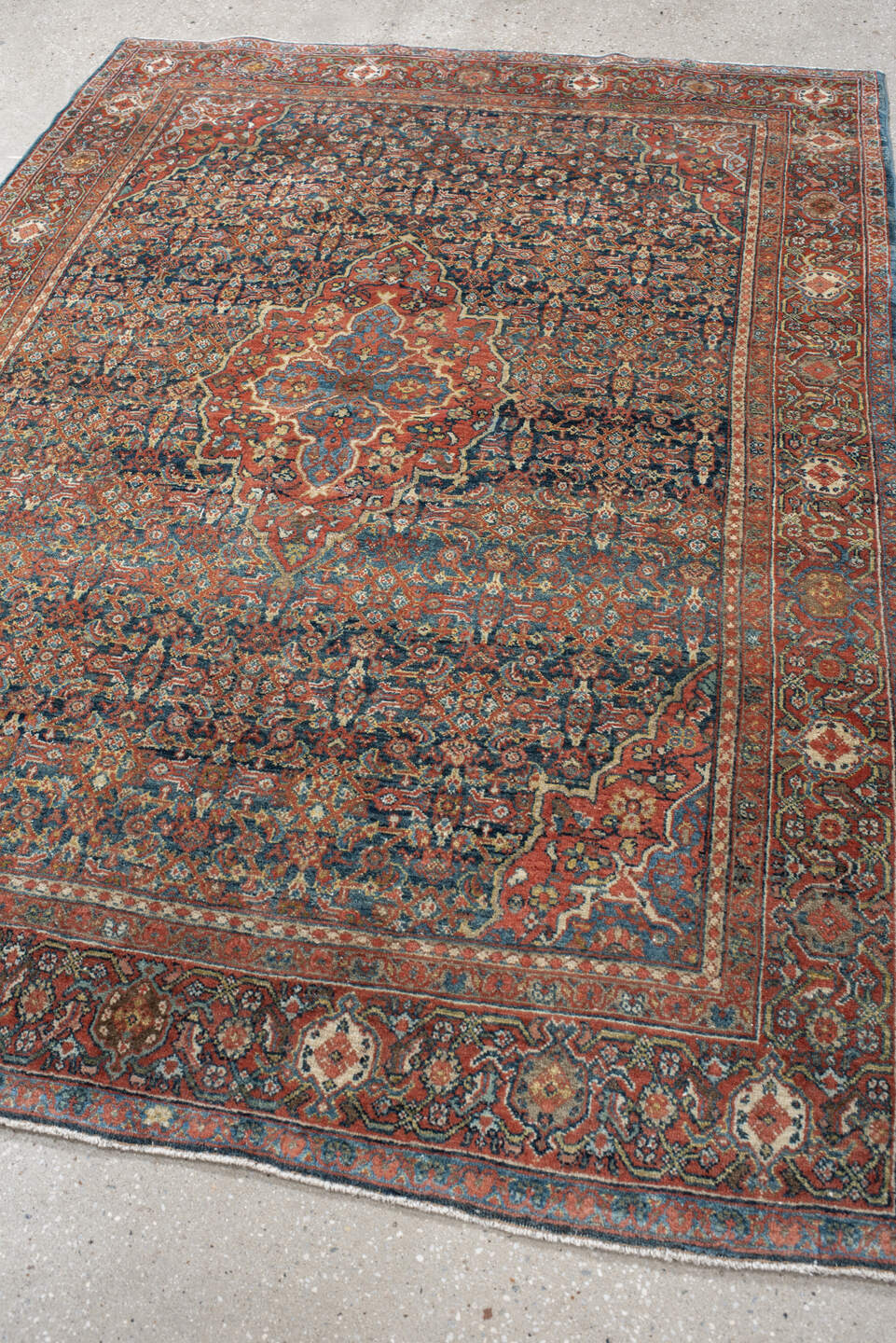 4' x 6' one-of-a-kind handmade antique Sarouk small size rug. Color palette: rust, navy, sky_blue, ivory, olive, coral