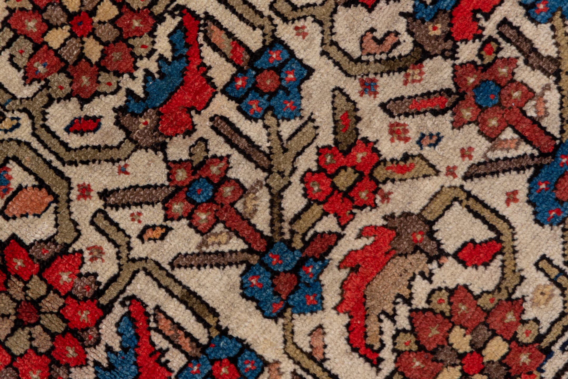 5' x 7' one-of-a-kind handmade antique Malayer rug. Color palette: ivory, rust, indigo, rose, taupe, charcoal, coral