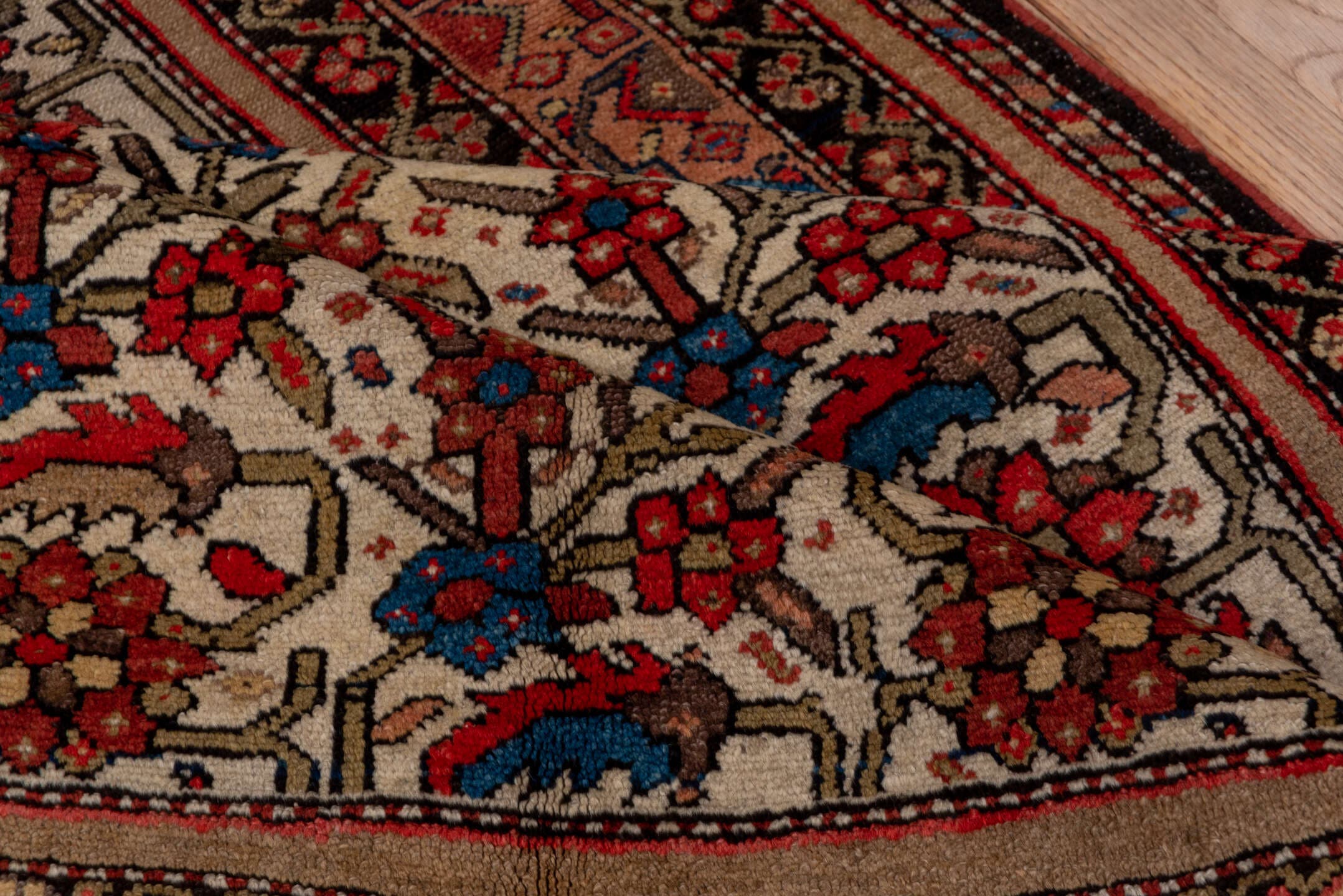 5' x 7' one-of-a-kind handmade antique Malayer rug. Color palette: ivory, rust, indigo, rose, taupe, charcoal, coral