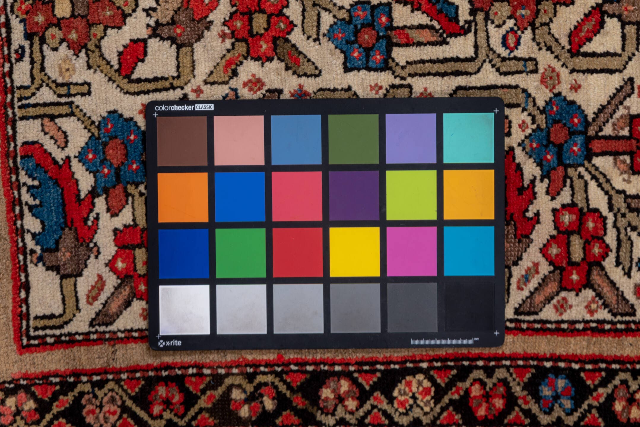 5' x 7' one-of-a-kind handmade antique Malayer rug. Color palette: ivory, rust, indigo, rose, taupe, charcoal, coral