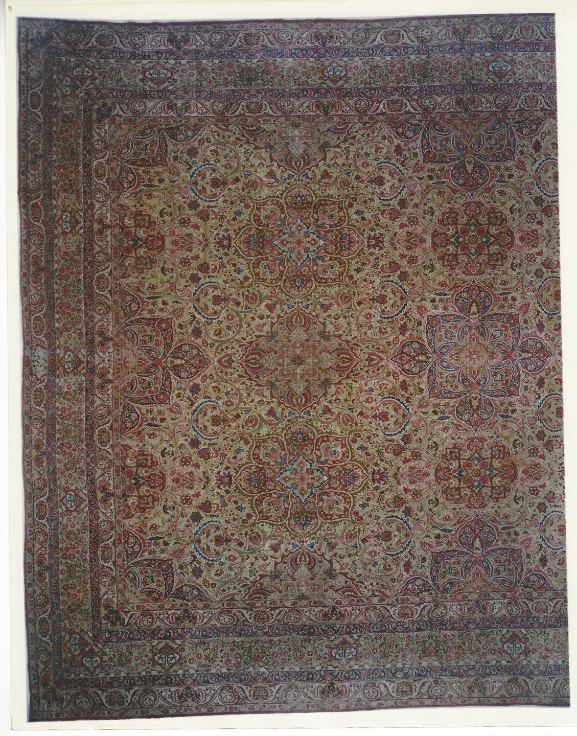 20' x 25' one-of-a-kind handmade antique Lavar oversize rug. Color palette: beige, rose, rust, soft blue, ivory, burgundy