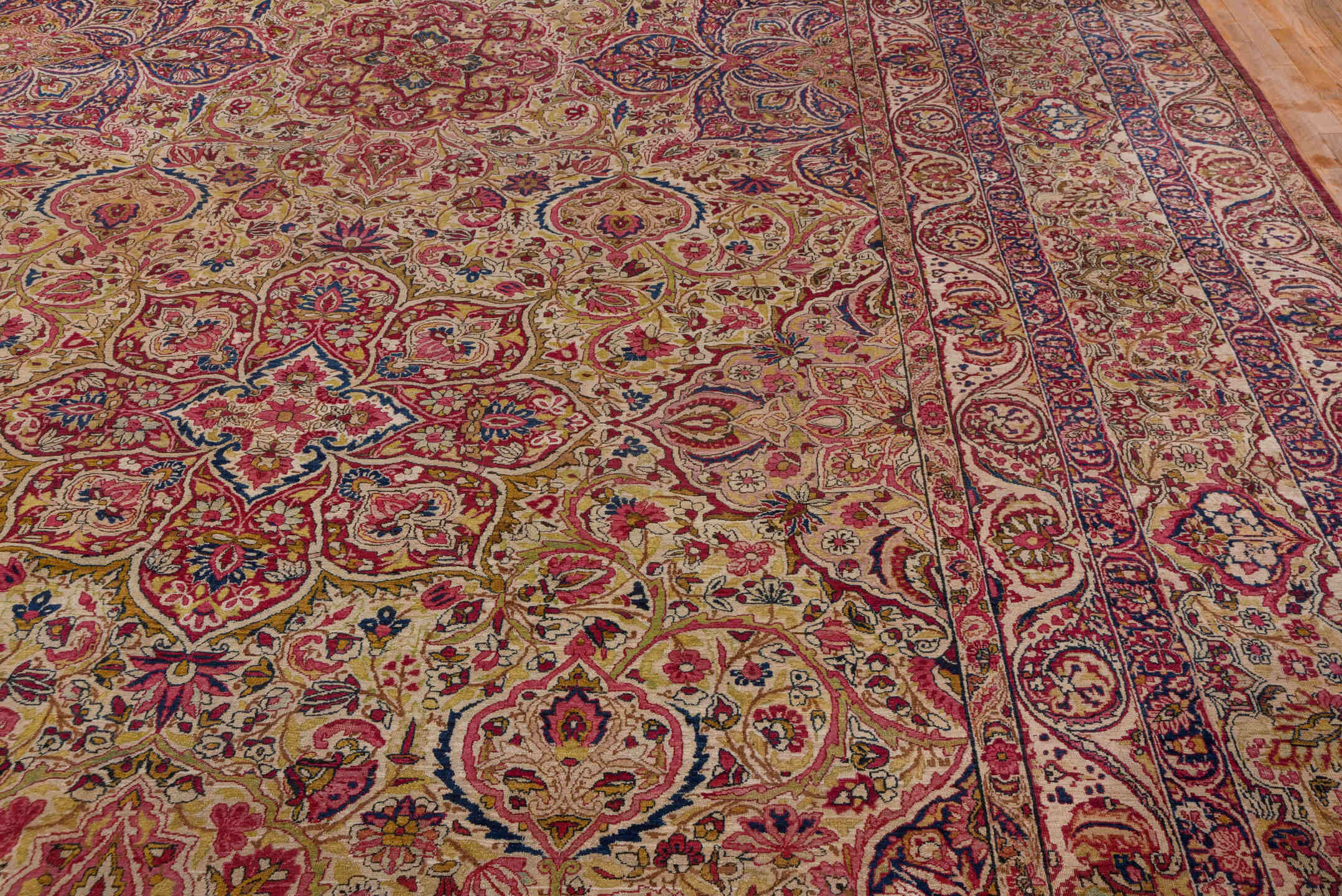20' x 25' one-of-a-kind handmade antique Lavar oversize rug. Color palette: beige, rose, rust, soft blue, ivory, burgundy