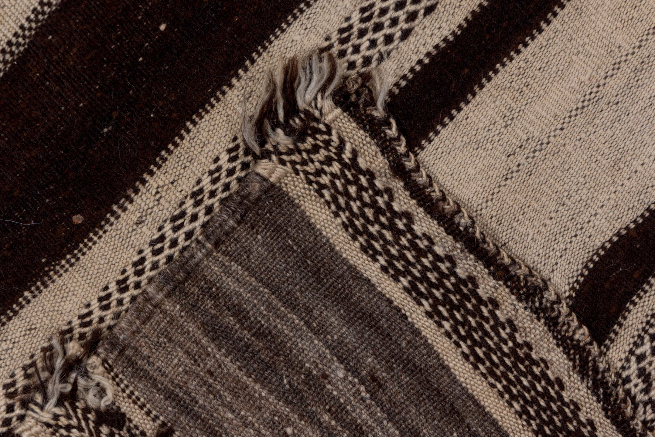 4' x 10' one-of-a-kind handmade vintage Blanket runner rug. Color palette: ivory, espresso, charcoal, taupe, brown, black