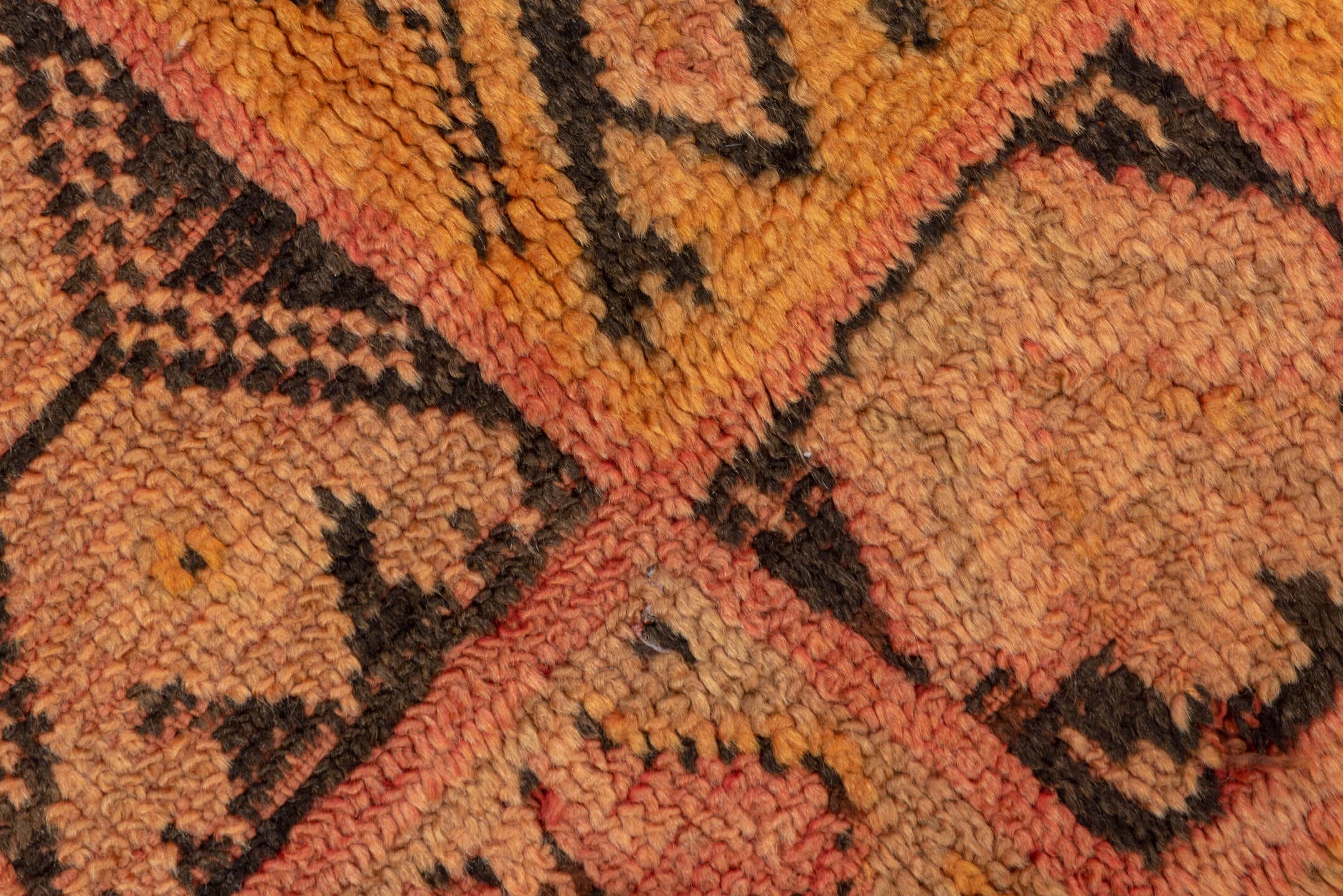 4' x 7' one-of-a-kind handmade vintage Moroccan rug. Color palette: salmon, terra cotta, peach, coral, charcoal, rose