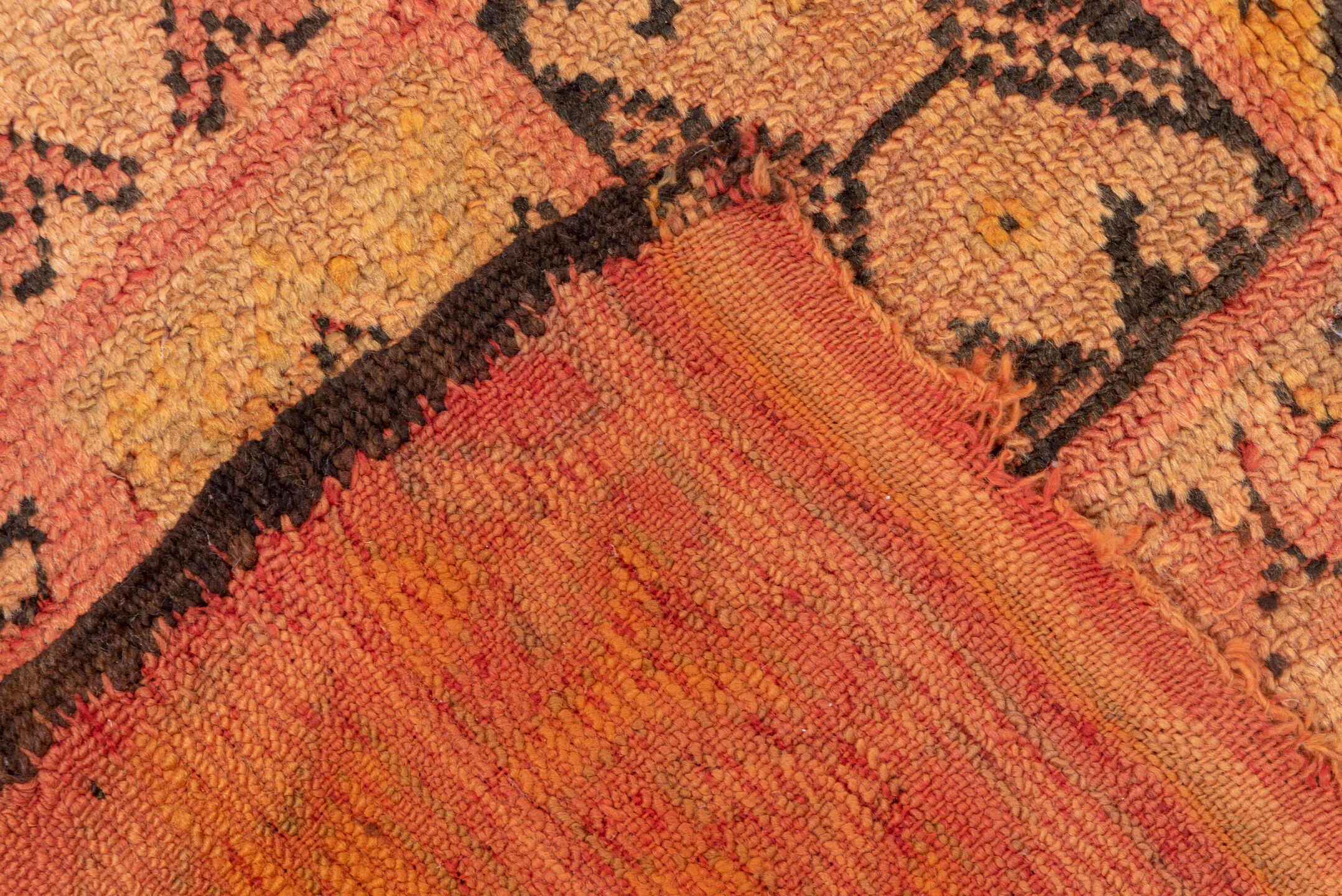 4' x 7' one-of-a-kind handmade vintage Moroccan rug. Color palette: salmon, terra cotta, peach, coral, charcoal, rose