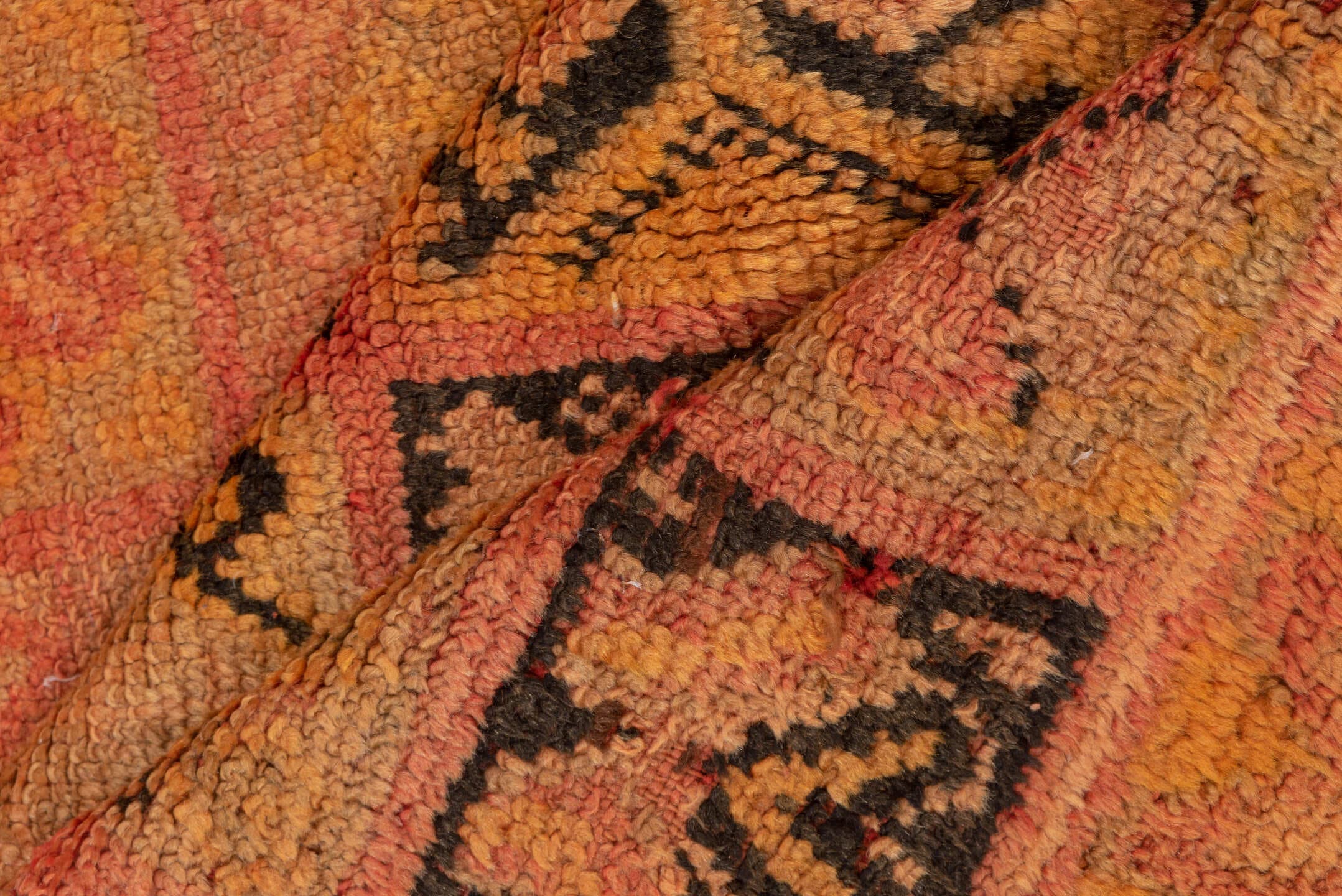 4' x 7' one-of-a-kind handmade vintage Moroccan rug. Color palette: salmon, terra cotta, peach, coral, charcoal, rose